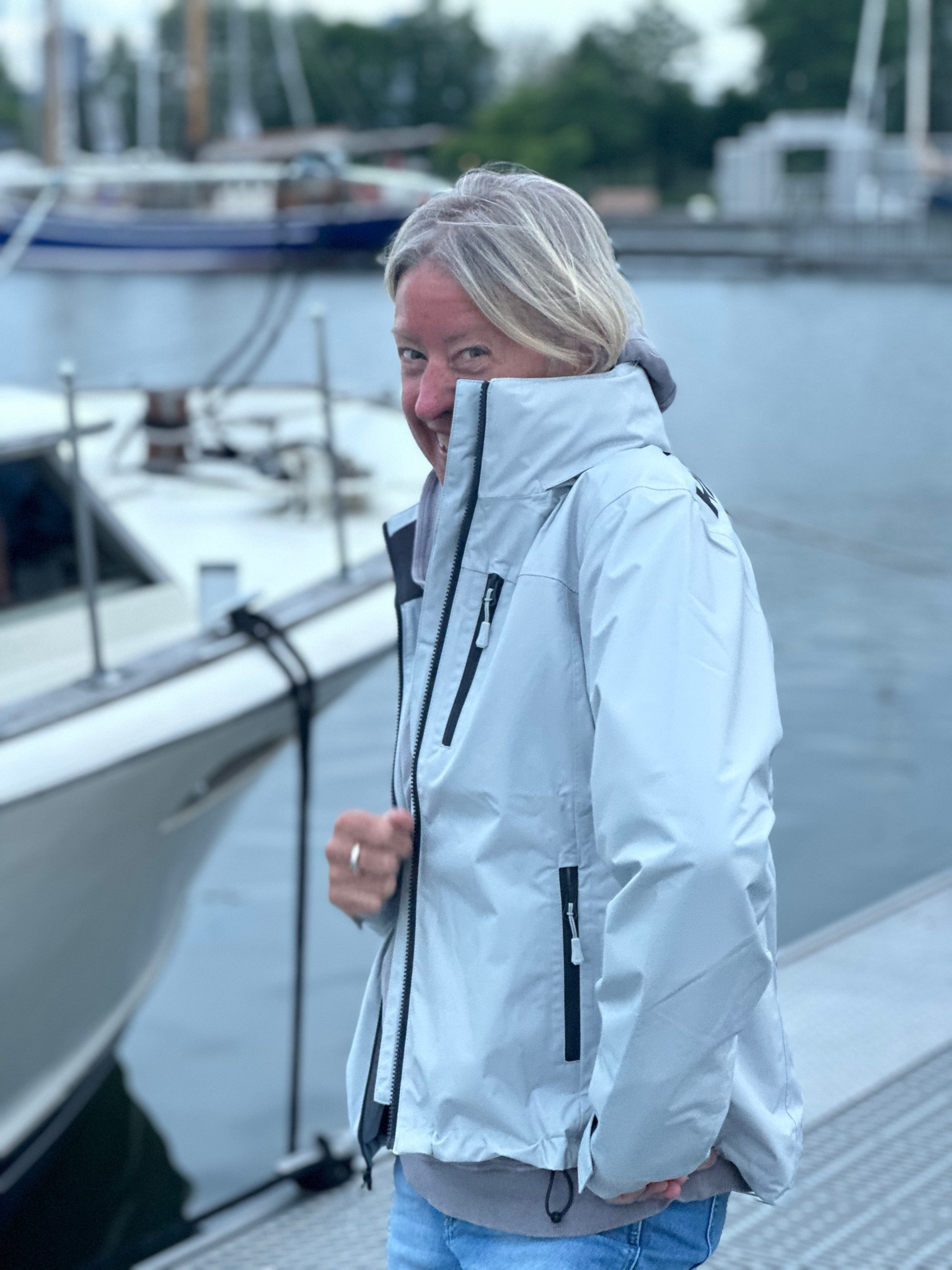 The perfect all weather jacket to protect you from rain , wind , and the cold .   
This Helly Hansen jacket is the perfect sailing jacket .  
It’s lightweight and has numerous pockets throughout to safely tuck away all the necessities .   
There is a hood also hidden in the collar which pulls out for those really windy days and Velcro to secure the wrist band.
The fabric is buttery soft . 
I sized up one as I like it to be roomy enough to allow for an extra sweater if needed . 
The color is a light grey 

Jacket @hellyhansen

#sailing
#windbreaker
#keepingdry
#lightweight
#springwear
#extralayer
#onthewater


#LTKcanada #LTKtravel #LTKsummer