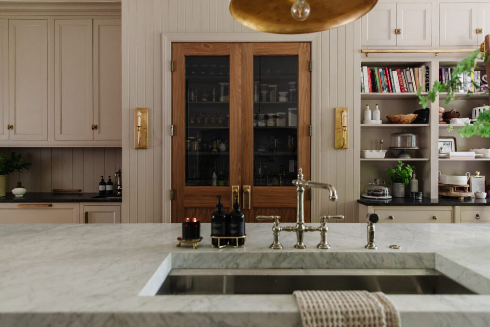 Moody Modern Traditional Kitchen 🖤

Pantry doors, kohler prolific sink, bridge faucet, sconce

#LTKSeasonal #LTKhome