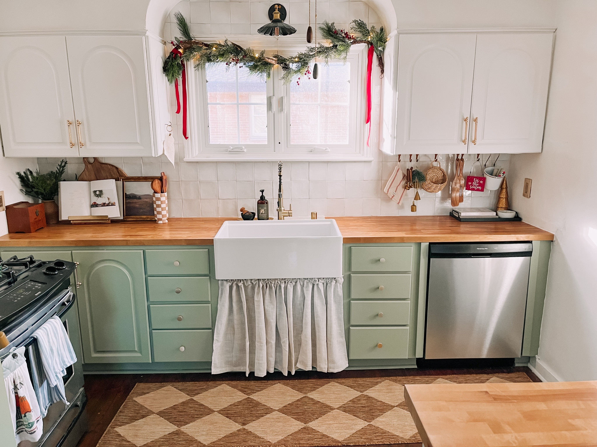 LOVING every bit of this 😍 #kitchendecor #holidaydecor #Christmasdecorkitchen #garland #ribbon #holidaydecorideas 

#LTKSeasonal #LTKhome #LTKHoliday