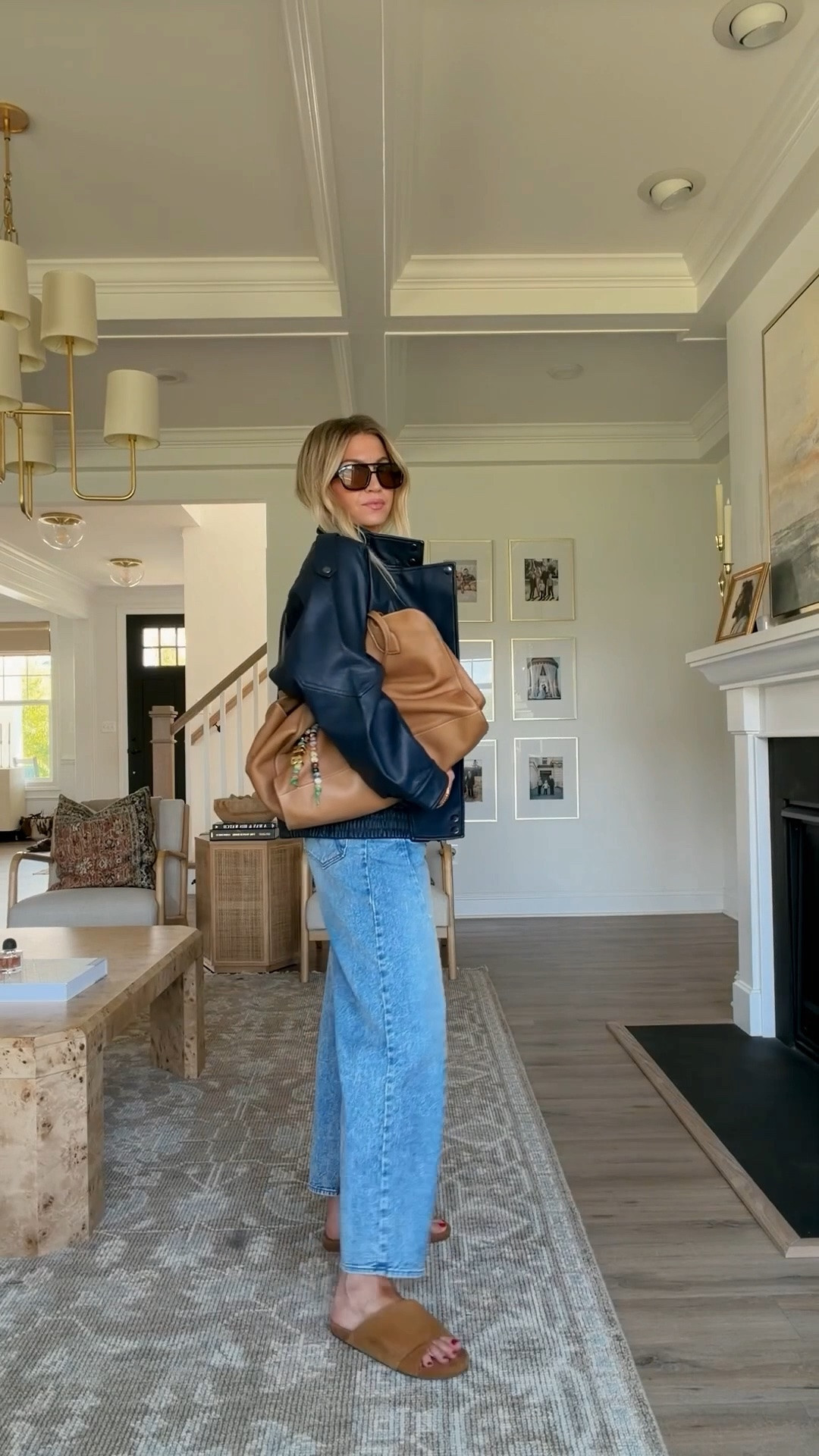 Casual Saturday outfit. 

Navy leather bomber jacket: Runs small, size up, wearing Med
Jeans: TTS, wearing 25
Tank: TTS, wearing XS long length
Siege camel sandals: SO comfy, TTS 

Parker thatch leather bag, Aire sunglasses

#LTKootd #LTKgrwm #LTKdayinmylife