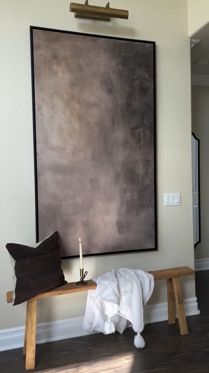 No DIY, just thinking bigger ✨ Comment ENTRY for the links! 

Swapped a console + small decor ( not to forget the fish tank 😂) for oversized art, a picture light, and a bench… and suddenly the whole entryway makes sense. Proof that simple changes make a big impact!! 

Home Decor, Simple Changes Major Impact, DIY Free Transformations, Simple Transformations, Home Upgrade, Elevate Your Home 

#entryway #entrywaydesign #simplechanges #focalpoint #highceilings

Entry way decor, oversized wall art, Etsy, abstract print, candleholder, bench, picture light, brass , vintage bench, skinny bench, noodle bench


#LTKSaleAlert #LTKHome #LTKSeasonal