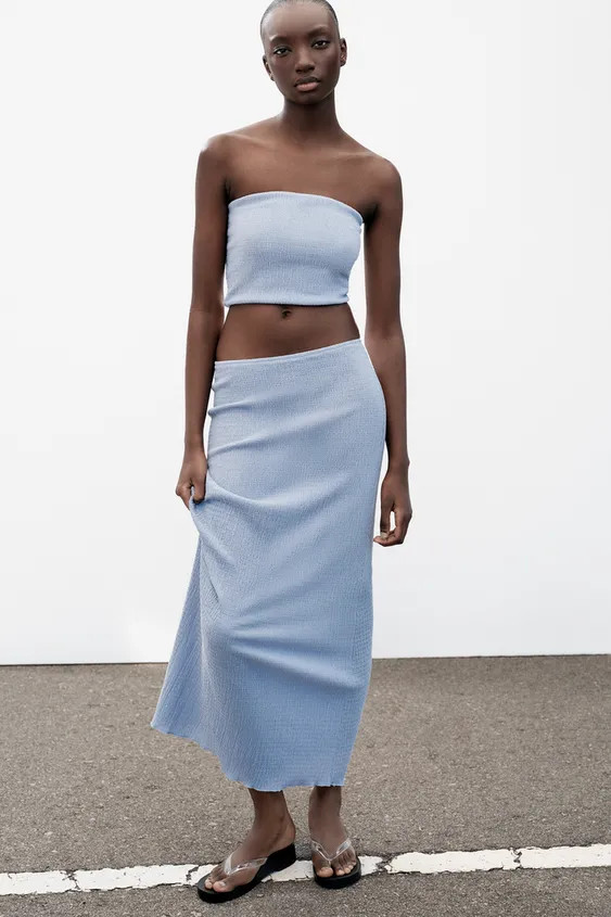 Mid-rise skirt with elastic waistband. Ruched fabric detail. | Zara US