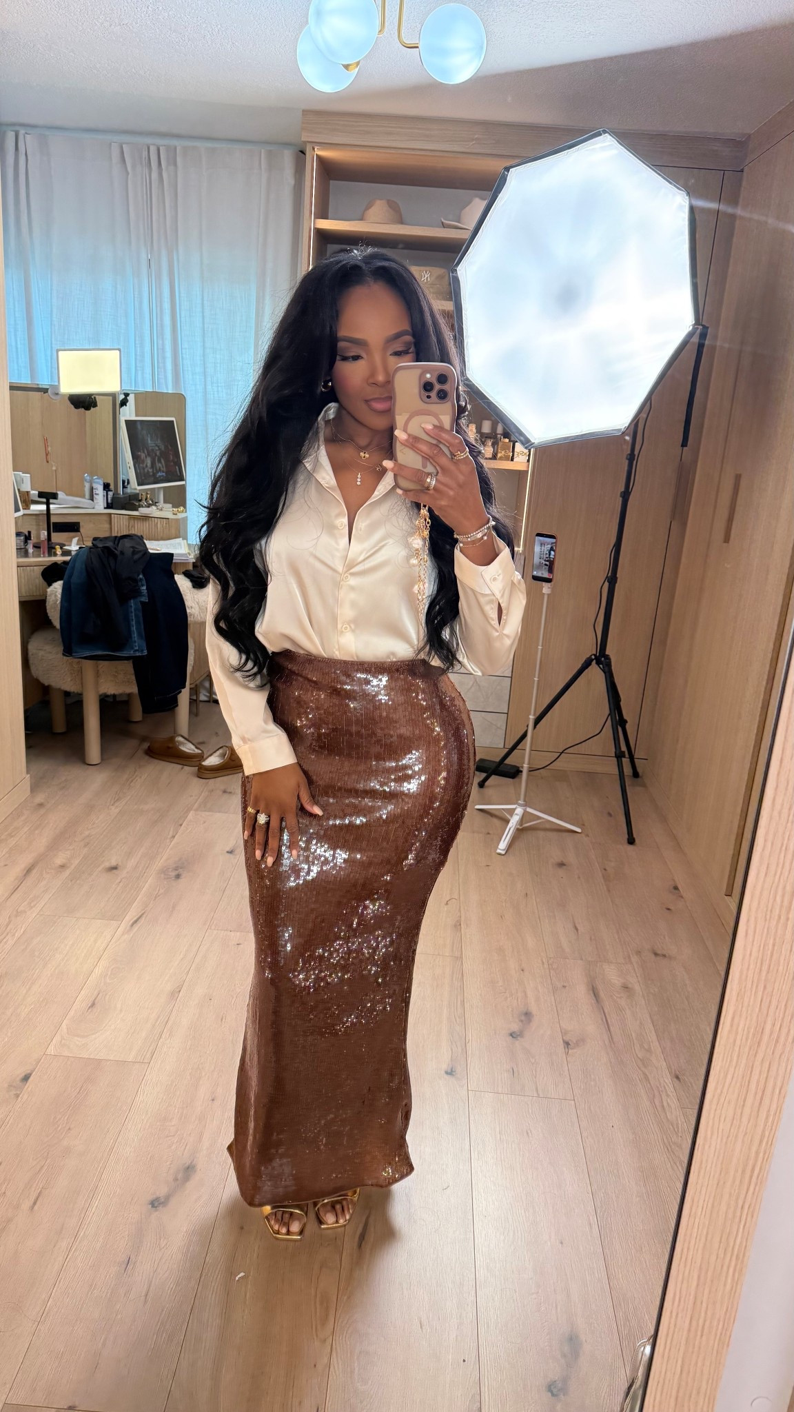 ✨ Luxe Evening Layers — satin blouse paired with a chocolate sequin skirt is the definition of polished glam. The soft drape of the top balances the sparkle perfectly, making this look feel elevated but still wearable. A timeless combo you’ll reach for whenever you want to stand out without overthinking it.

Perfect for date nights, holiday parties, cocktail events, and dressy dinners.

📏 Sizing:
Blouse: Small  
Skirt: Small  
Measurements: 5'4" · 138 lbs · 34D · 27” waist · 40” hips

Elegant evening outfit, sequin skirt styling, satin blouse outfit, holiday party look, dressy neutral outfit, elevated night-out style.

Follow me on Instagram and YouTube @kirasfashionfinds