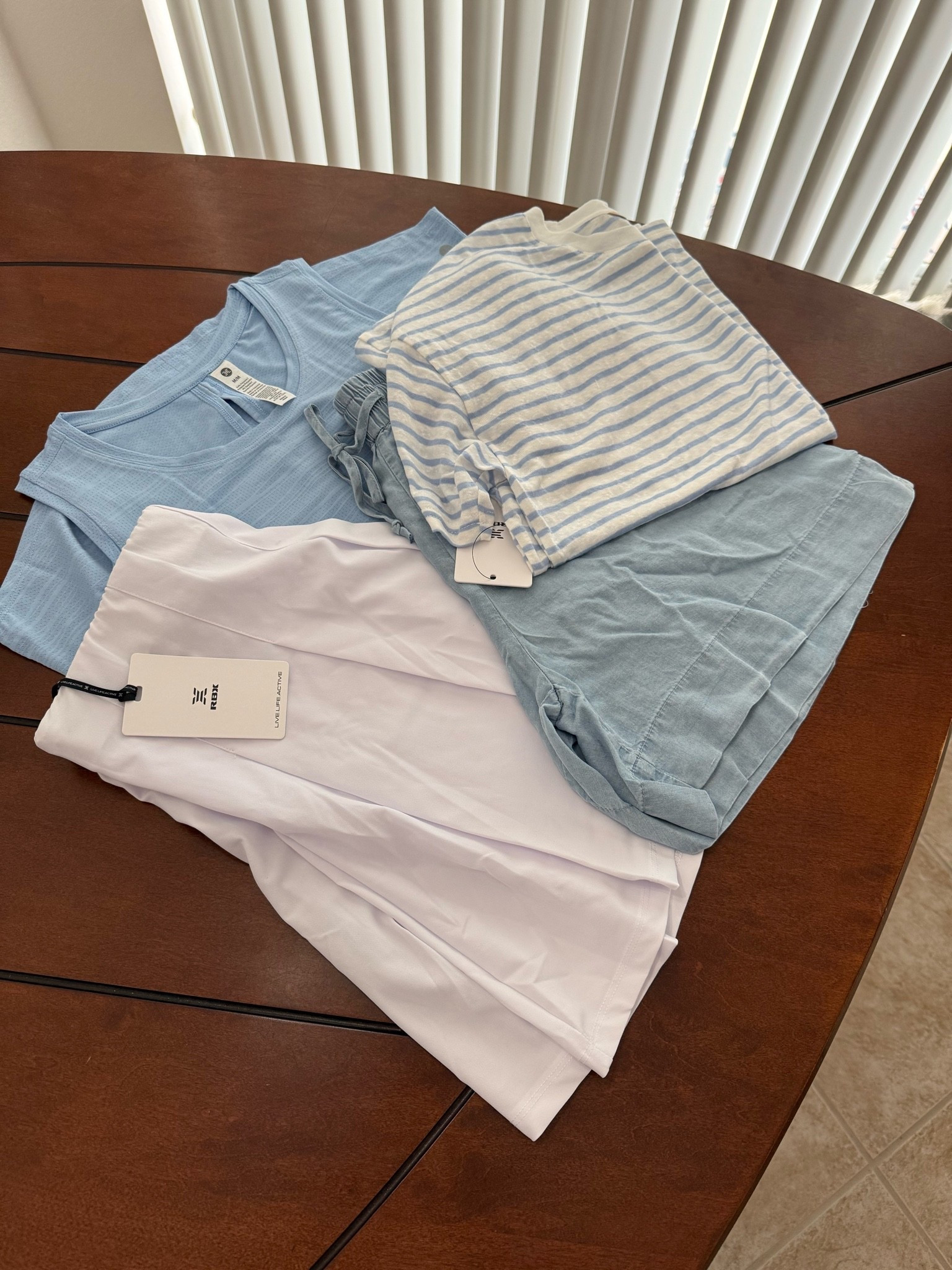 New pieces from RBX Active! I am so excited about the tennis skort and chambray shorts! Paired with the blue tank and striped tshirt, I have the perfect summer color palette! Everything fits true to size! #ad #rbxactive @RBX Active

#LTKActive #LTKSeasonal #LTKgrwm