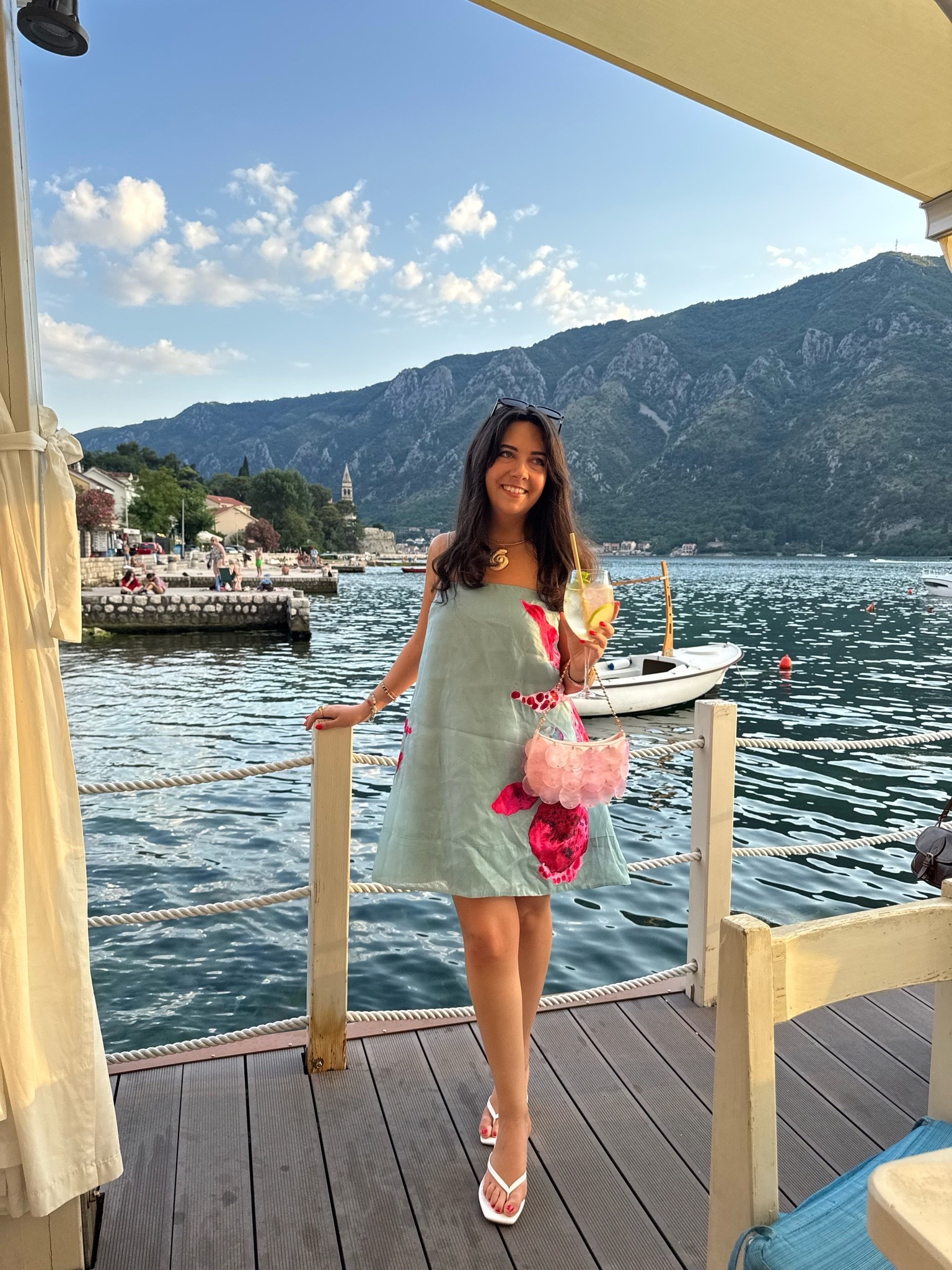 Vacation style at its best 🌊💐 This breezy linen mini dress is the perfect throw-on for dinner by the water—lightweight, effortless, and such a fun statement with the floral detail. Paired it with comfy white flip flops, a floral shoulder bag, and simple gold jewelry for an easy summer vacation look. Everything linked here! 🤍✨

#LTKdayinmylife #LTKootd #LTKSeasonal