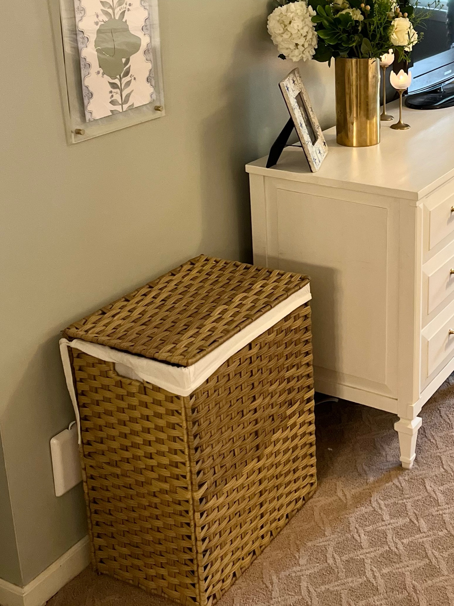 This incredible “gadget” has made it so much easier to plug in bulky cables. It plugs in and then runs the power strip a few feet away, allowing you to put it easily behind furniture or tight spaces. I’ve also linked the outlet covers that help to make our beige outlets look SO much better! (We like the hamper but heads up, it’s a synthetic material, not a natural woven fiber like I thought originally when buying).

#LTKhome