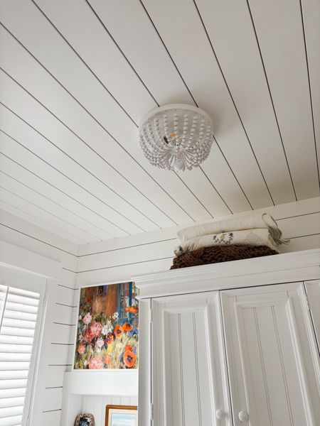 White wood bead semi flush mount chandelier in the tiny cottage

#LTKHome #LTKStyleTip #LTKSaleAlert