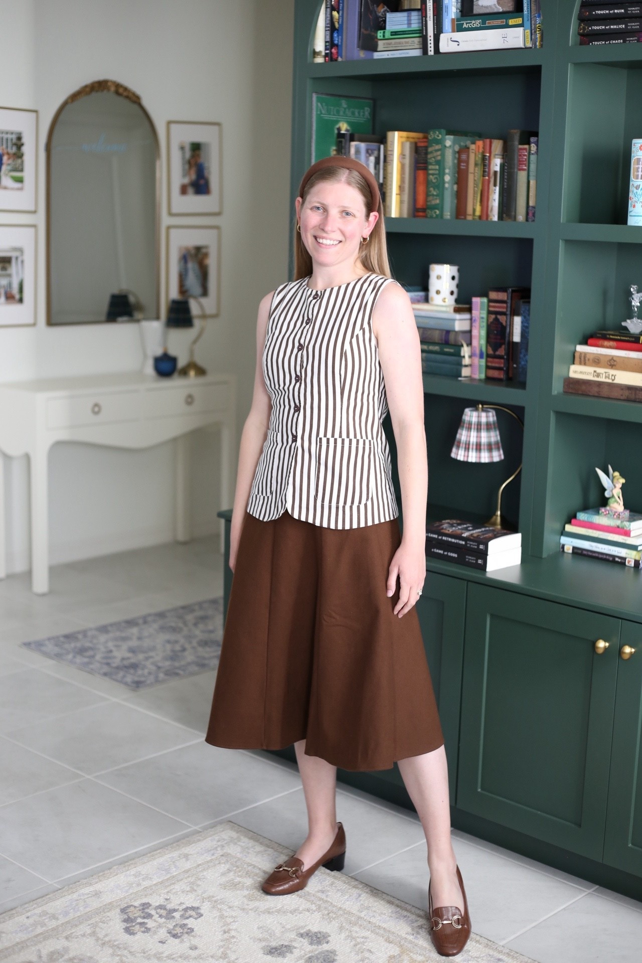 How to style a waistcoat vest top in the office. Pair with pants or with a midi skirt  