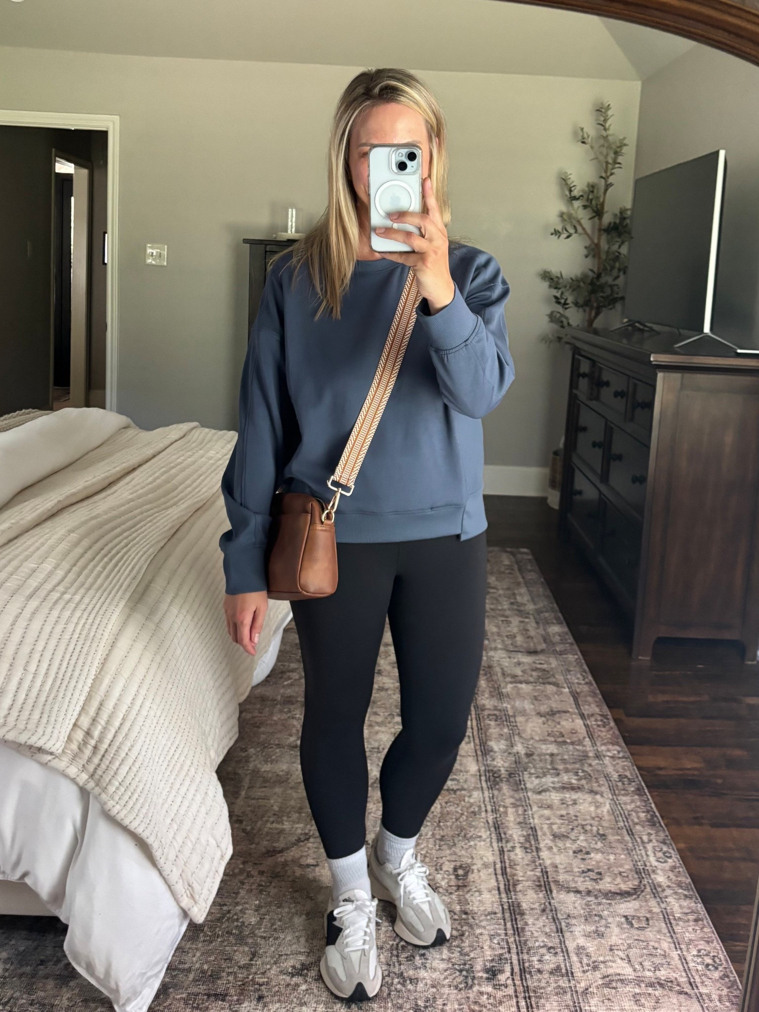 Today’s OOTD!  Wearing a M in the top. Have had this affordable Amazon purse since the fall and love it!  Wear it every day and still looks brand new!  

Sports mom, weekend outfit, casual outfit, soccer mom 

#LTKOver40 #LTKootd #LTKmomlife