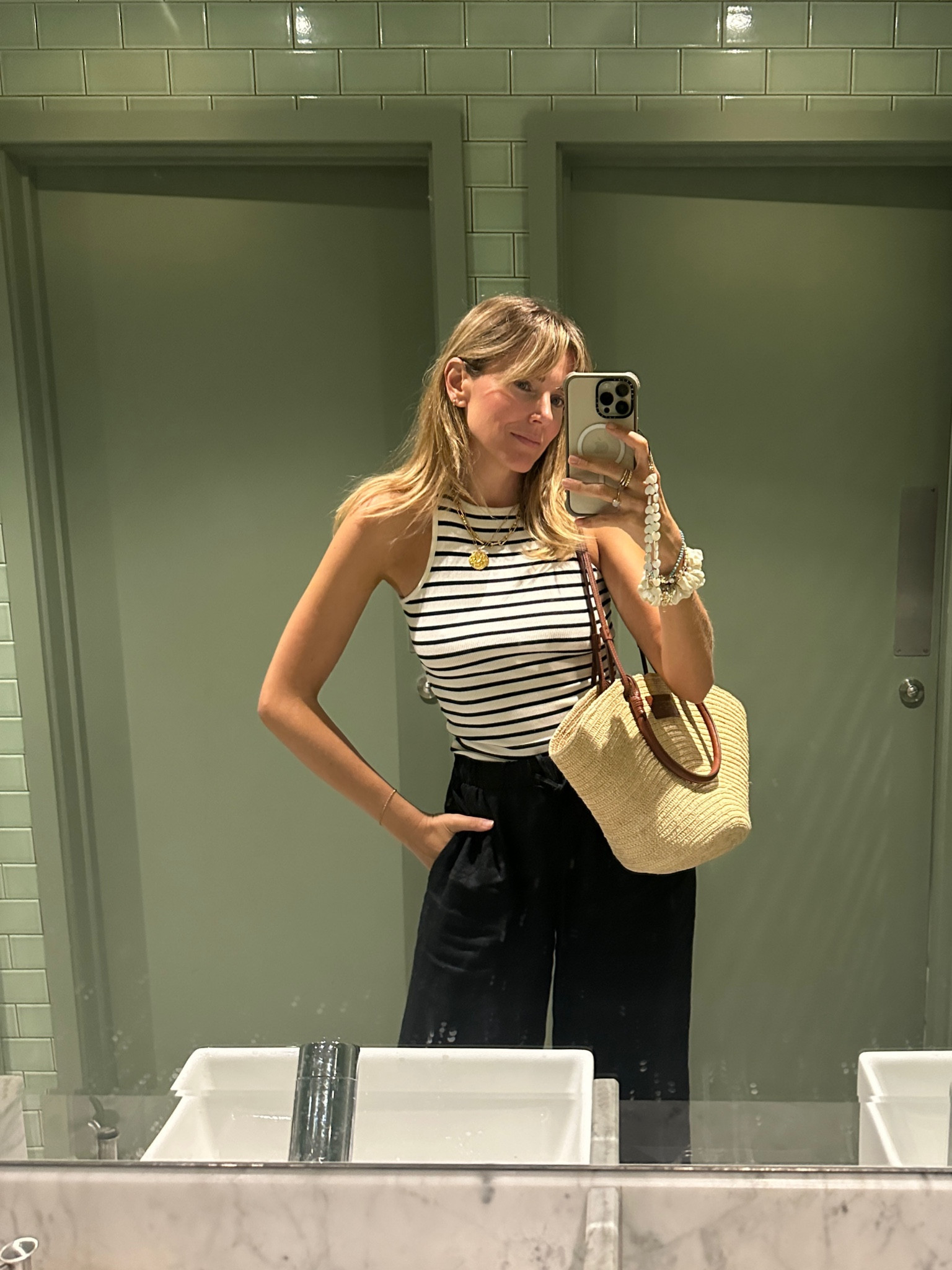 Striped vest 
Linen trousers 
Basket bag 

#LTKeurope #LTKSeasonal #LTKstyletip