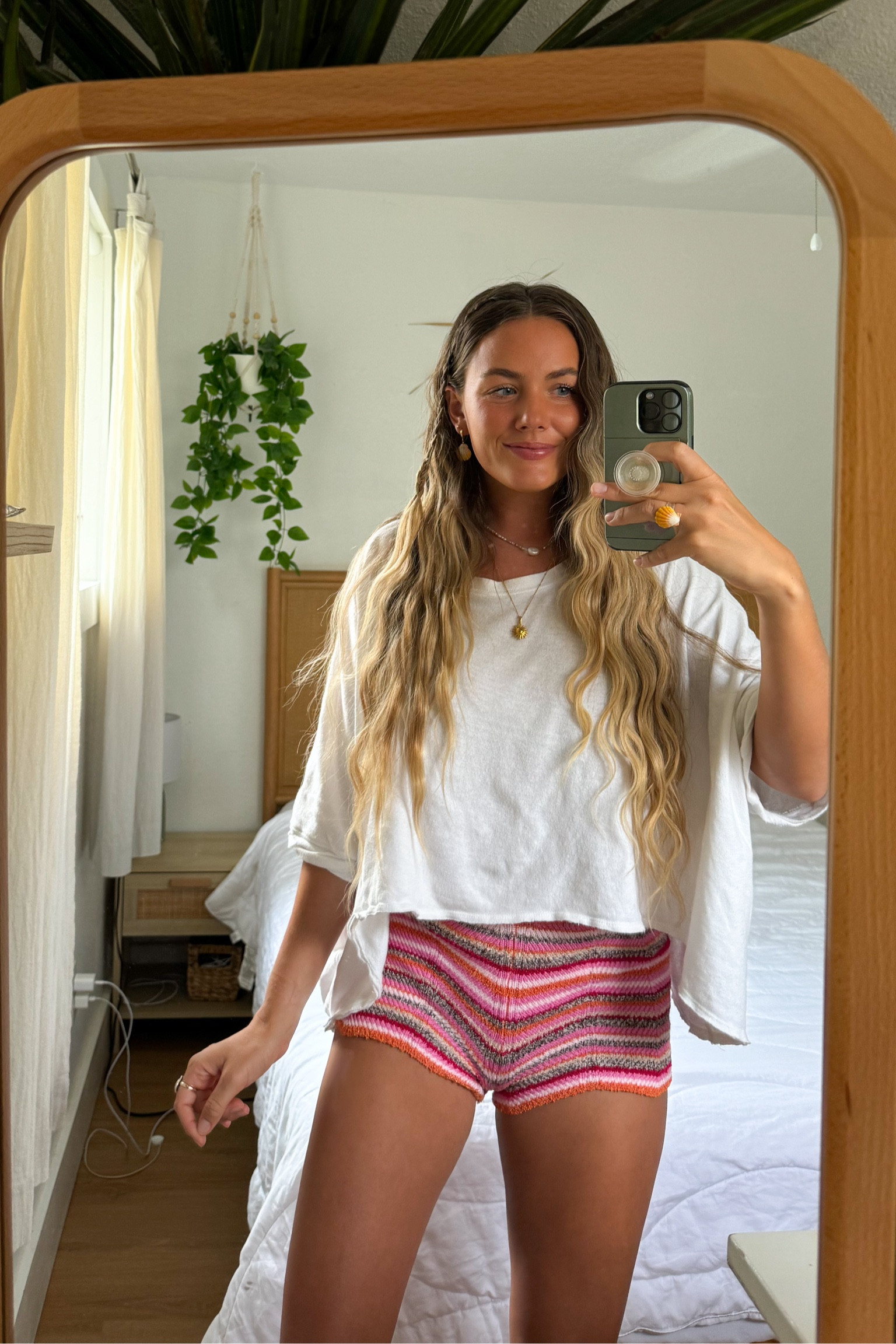 Wearing medium top & small bottom - size down for the bottoms they’re SUPER stretchy. I’m normally a medium and they were falling off of me. 