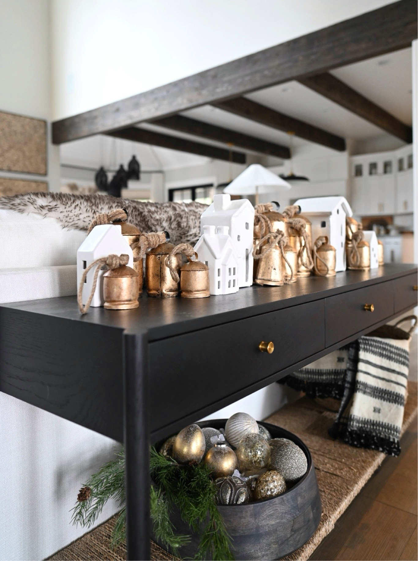 Using these holiday bells and ceramic houses this year on my console. Going for a simple look, yet festive  

#LTKHoliday #LTKfindsunder50 #LTKhome