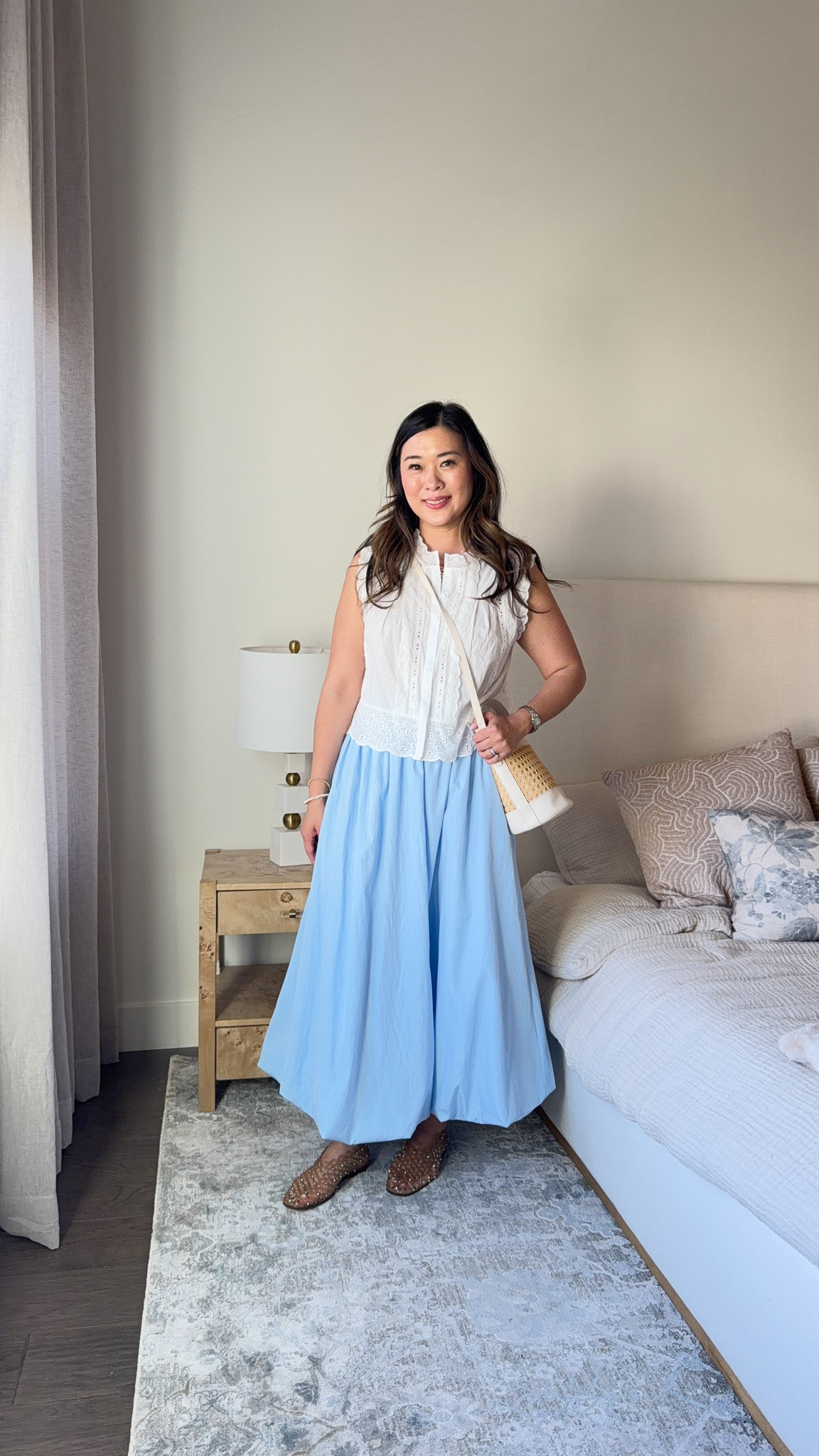 Love a good white blouse that reminds me of Free People. And I swear this skirt gives me Anthro vibes! Such an easy and chic Summer look!
Tank: Medium
Skirt: Small

#LTKootd #LTKSeasonal #LTKPetite