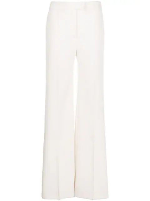 high-waisted flared trousers | Farfetch (US)