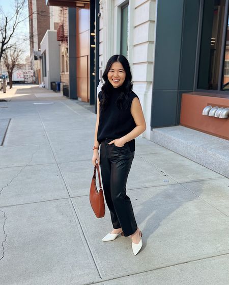Black sleeveless sweater (XS)
Black faux leather pants (27P)
Brown bag 
White pumps  (1/2 size up)
Smart casual outfit 
Neutral work outfit 
Business casual outfit

#LTKfindsunder100 #LTKworkwear #LTKSeasonal