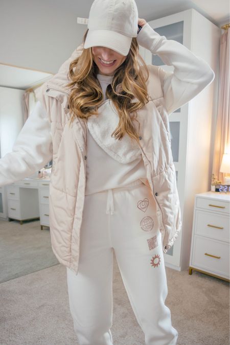 Staying warm and cozy in my winter whites ♥️❄️
Wearing a size medium in the vest in the khaki color option. I went with a size extra small in the pants. I’m wearing a size large in the sweatshirt, but should have gone with a small or a medium.

Winter outfits | winter vest | sweatpants | white sweatshirt | Amazon fashion finds | Amazon outfits


#LTKSeasonal #LTKstyletip #LTKfindsunder50