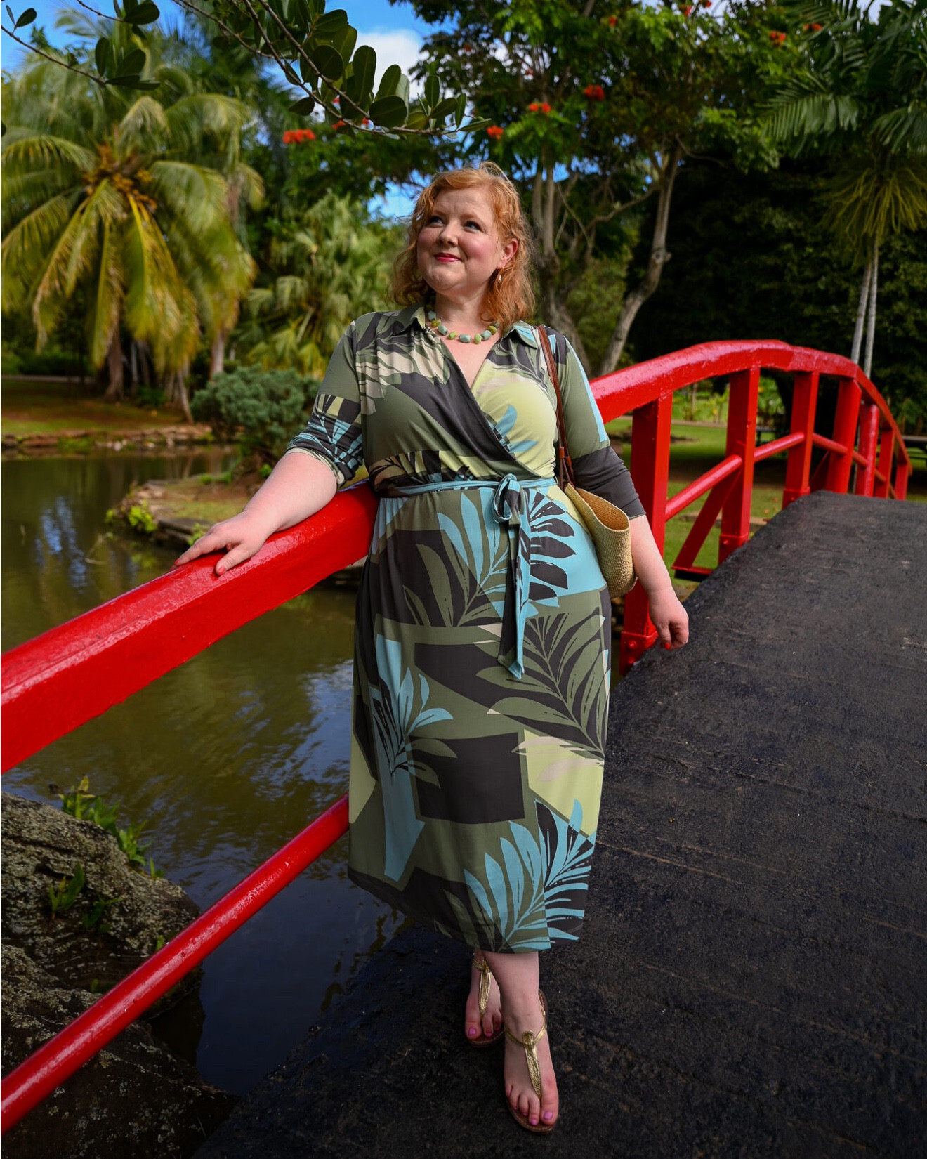 On every vacation, we book a special dinner out, and I always like to pick up a new dress for the occasion. On this trip, we booked a garden luau. When I spotted this Geometric Leaf Print Long Sleeve Pocket Dress , I knew it’d be perfect with the dreamy greens and blues and oversize palm leaf print. What I especially like about the dress is that it’s tropical but a bit more subdued for wear beyond vacation.

This is a fun style you can pick up new for vacation but continue to wear all spring and summer long. I played up the tropical vacation vibes with a hair flower, chunky beaded necklace, and straw bag. Priced at $79.95 ($52 with code WWWULLA) and available in sizes 12/14-32/34, I’m wearing the size 16/18 and it’s a faux wrap in a slinky stretch fabric.

#LTKTravel #LTKPlusSize #LTKootd