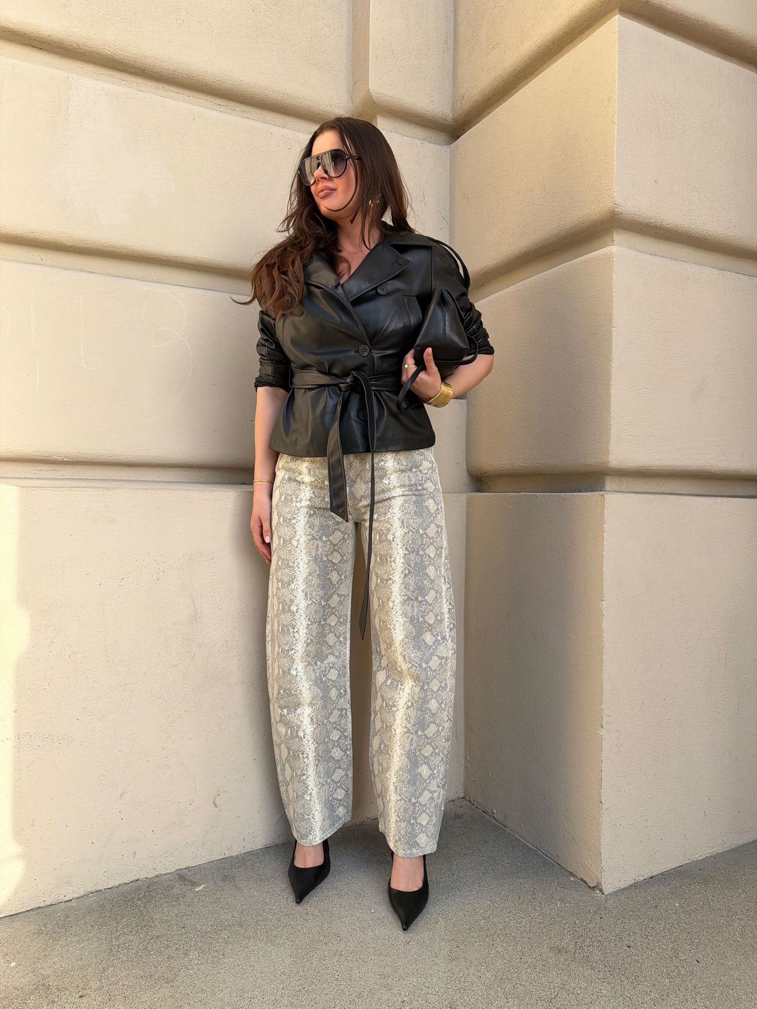 Styling  snake print pants with a back leather jacket, black slim backs and black leather shoulder bag. Gold jewelry and aviators to elevate the look

#LTKWorkwear #LTKootd #LTKSeasonal