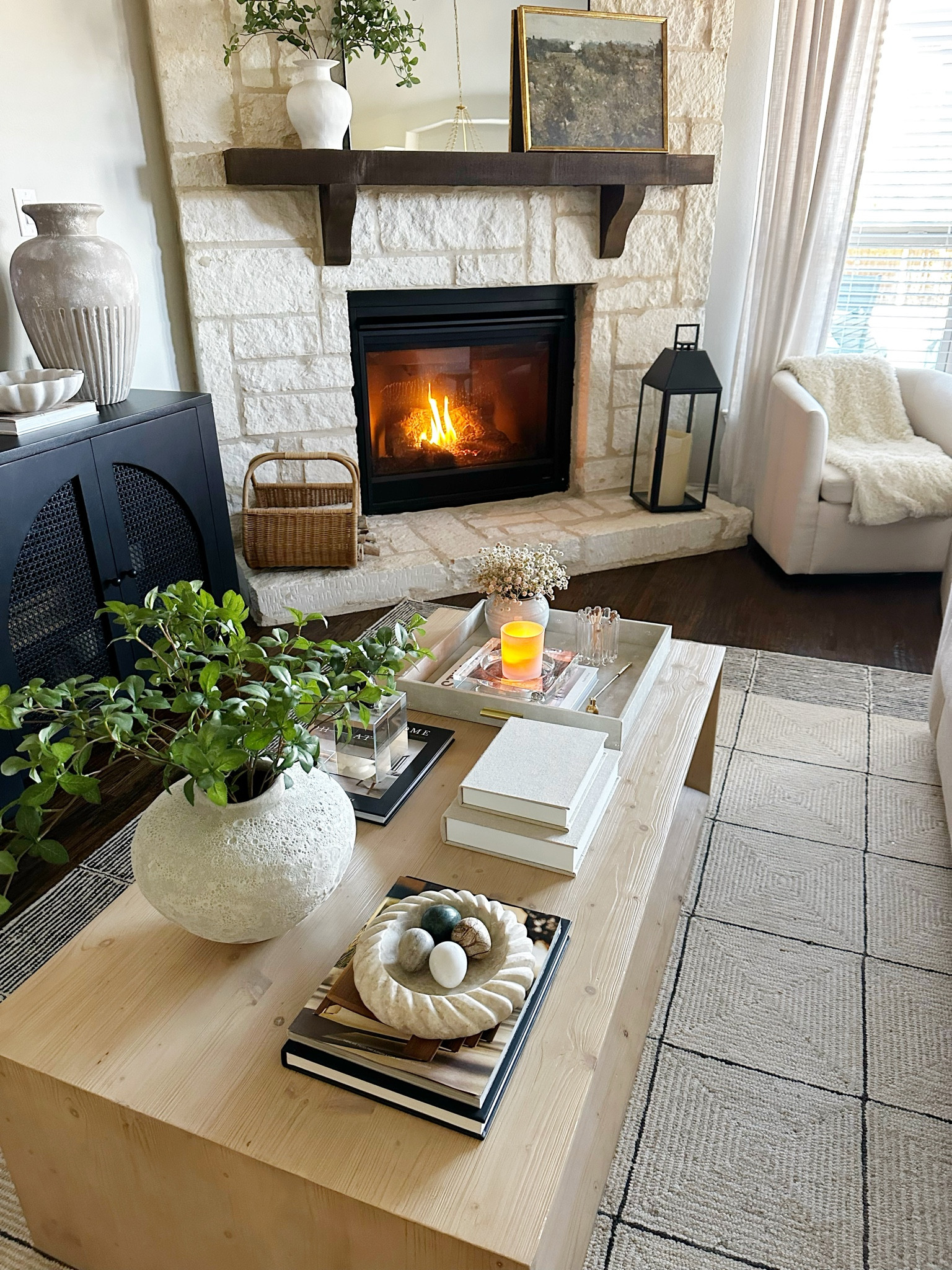 Living room coffee table spring styling 

#LTKHome #LTKSeasonal #LTKStyleTip