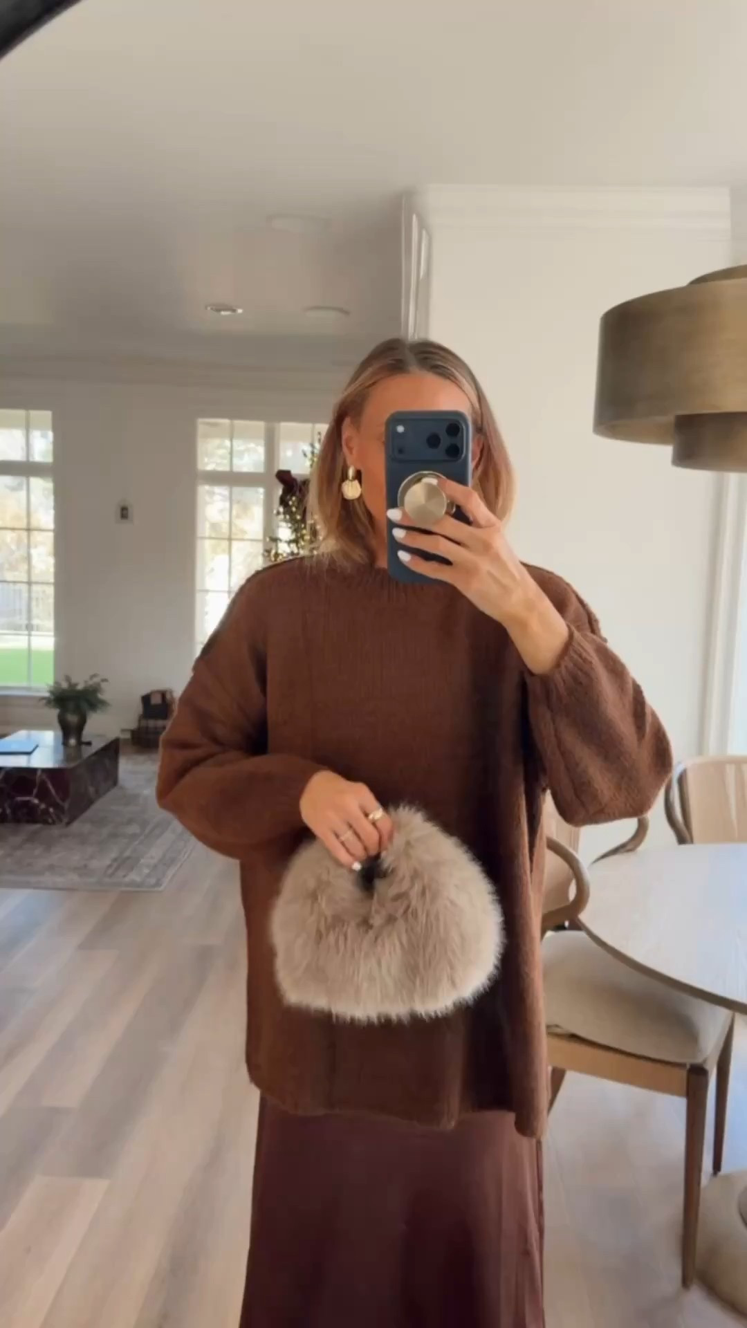 This is one of those outfits that does all the work for you ✨ Perfect for holiday events and ringing in the New Year 🥂

Wearing a medium skirt & small sweater (oversized fit). 