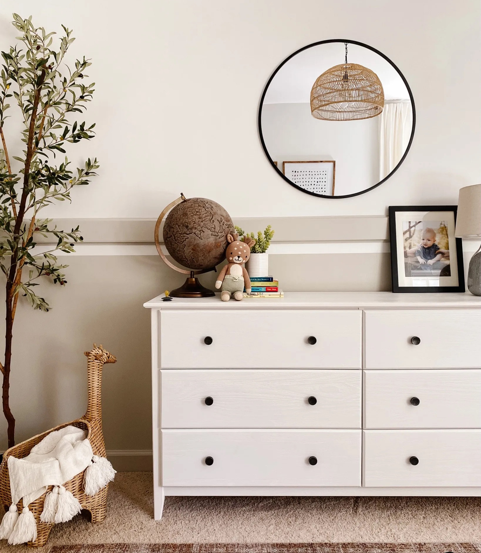 My baby boy is getting a big boy room so I had to share some pics from his nursery! We added a white dresser, circle mirror, rattan accents, fake olive branch and a light green/gray finish for the ultimate neutral boy nursery. Nursery DIY, boy nursery, neutral nursery, home remodel

#LTKkids #LTKhome