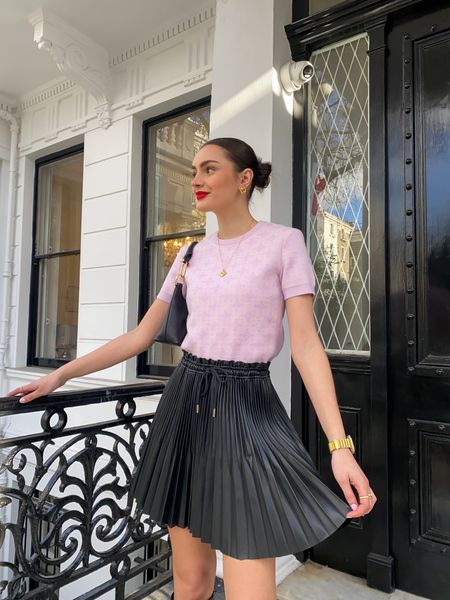 Lighter layers for spring 🌸 
Pink short sleeve top, pleated recycled leather look skirt, shoulder bag, red lipstick, gold jewellery

#LTKstyletip #LTKSeasonal
