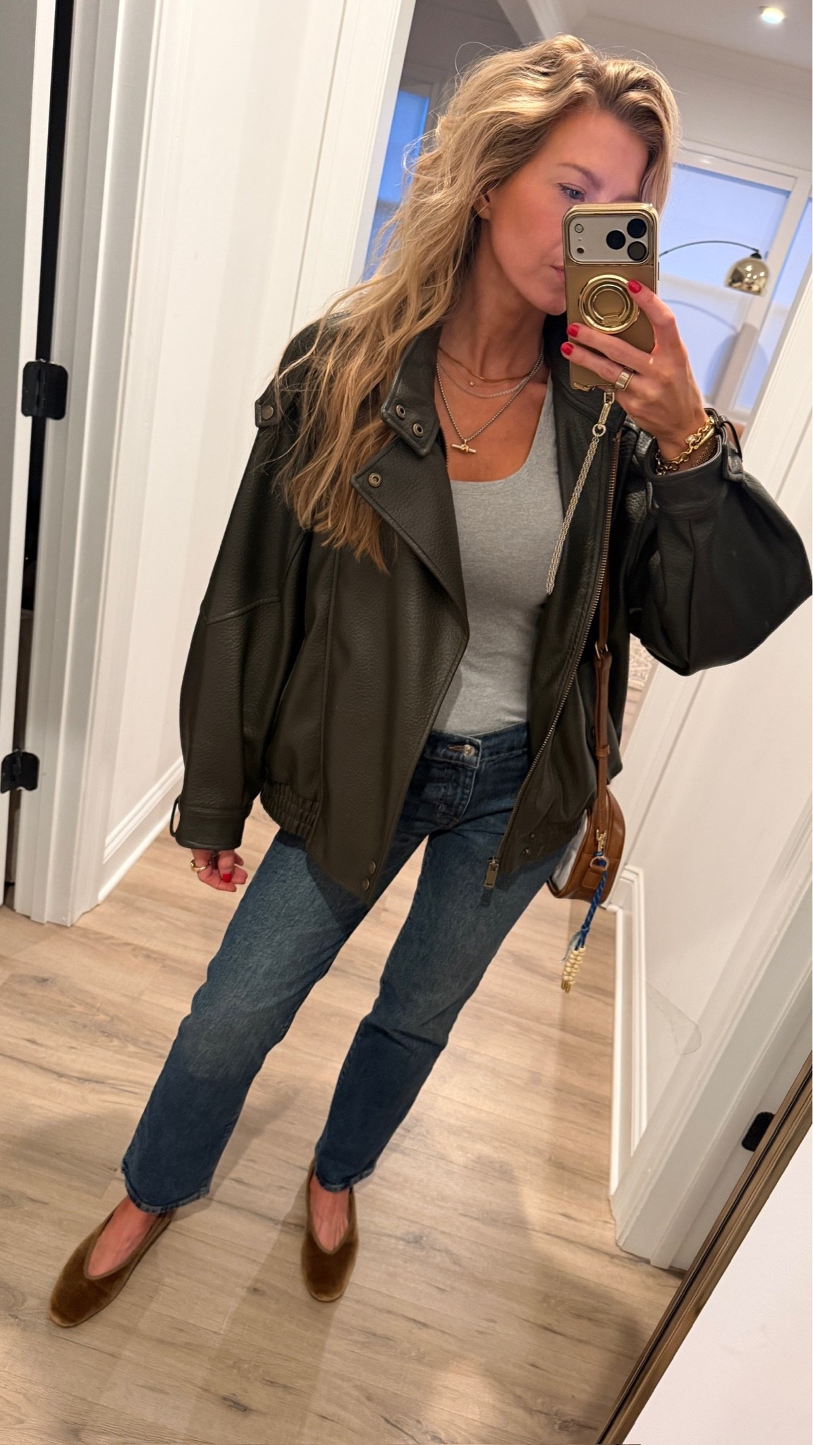 My outfit to the football game last night.

Dark green, faux, leather bomber: run, small, wearing a medium
Grey tank: TTS, wearing an extra small long length
Dark denim cigarette jeans: TTS, wearing a 25
Gold velvet flats: TTS

#LTKdayinmylife #LTKgrwm #LTKootd