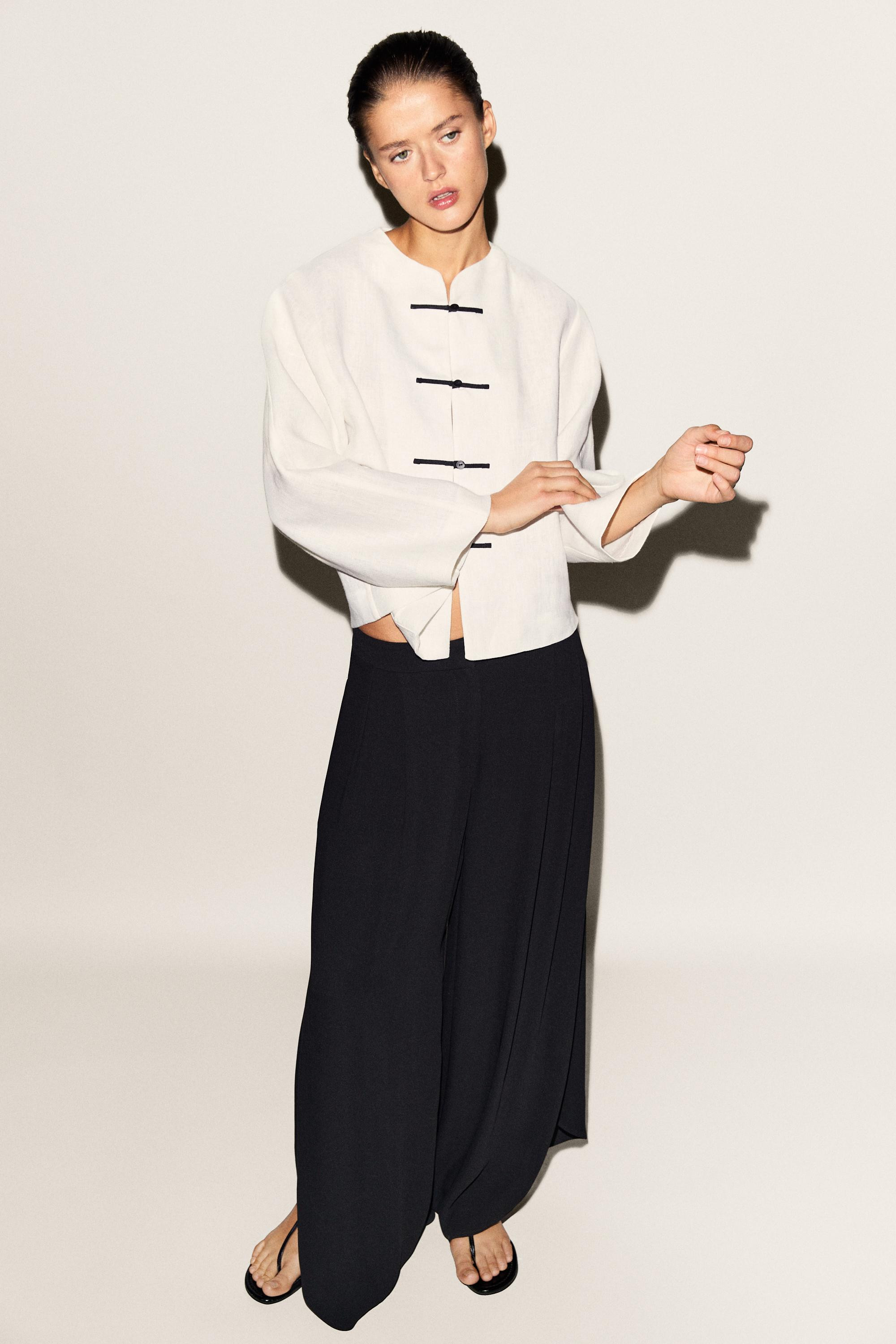 100% linen flowing shirt with button detail | Massimo Dutti UK