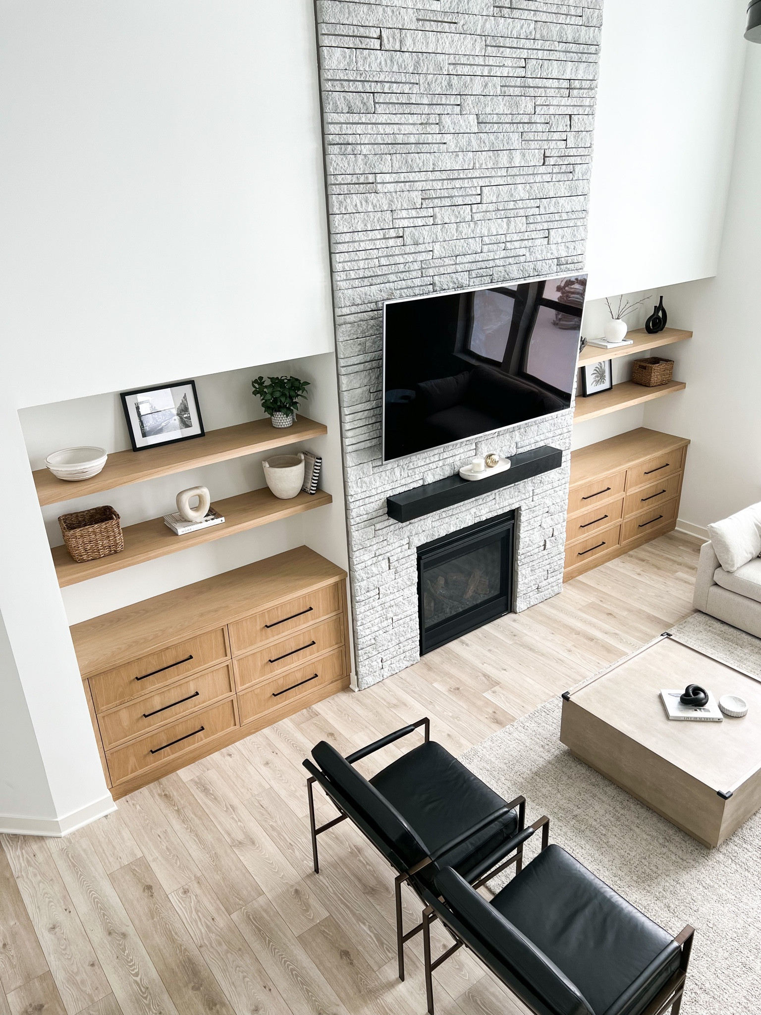 Our built-in cabinets receive a lot of love!!! If you're wondering what kind of wood and finish they are! It's White Oak with a clear coat. 

#homedecor #shelves 

#LTKstyletip #LTKSeasonal #LTKhome