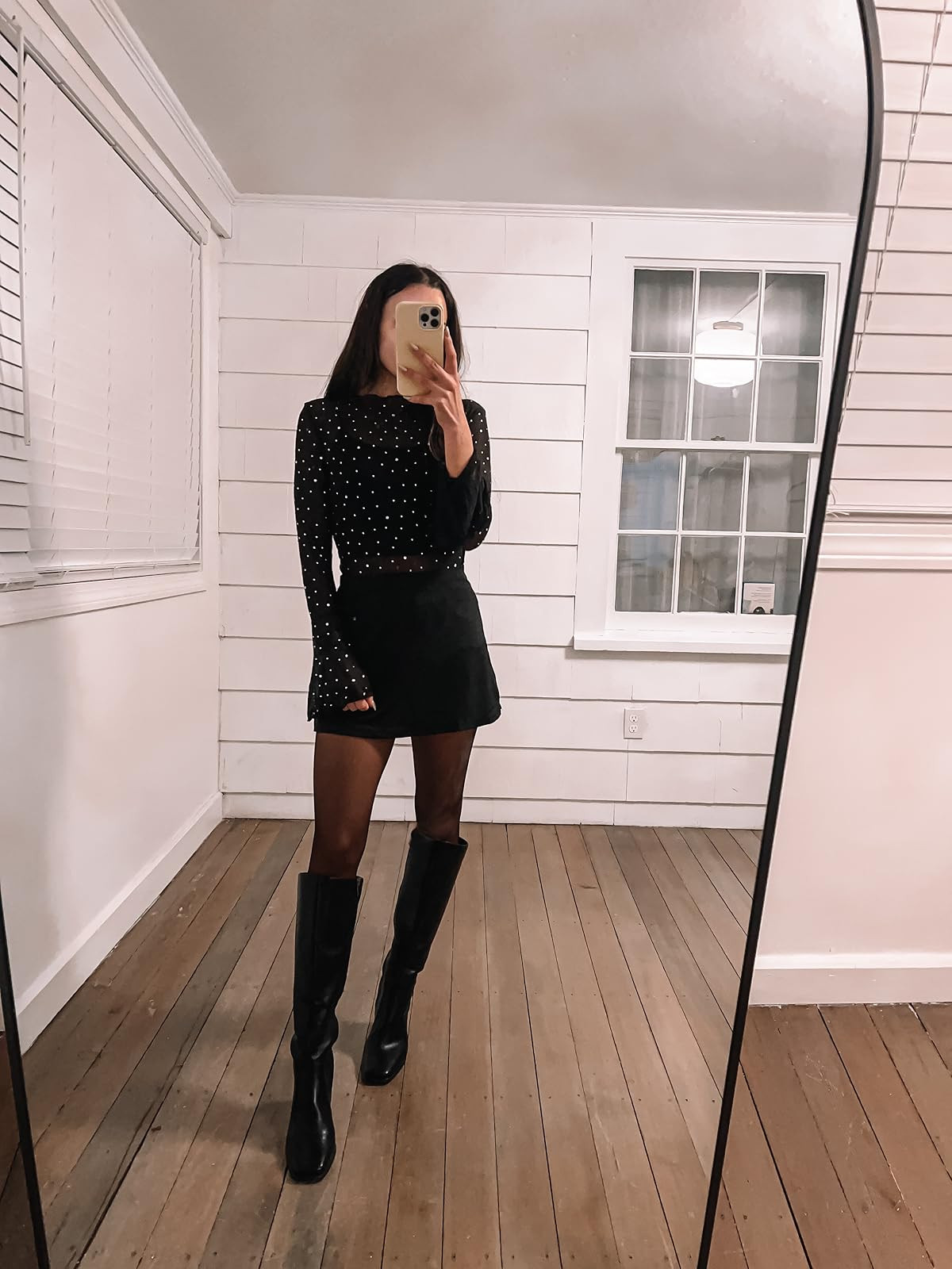 New years outfit- top in s, boots true to size, skirt in xs. Black knee high boots/black mini skirt/mesh top. 
 

 #LTKHoliday #LTKPetite #LTKFindsUnder100