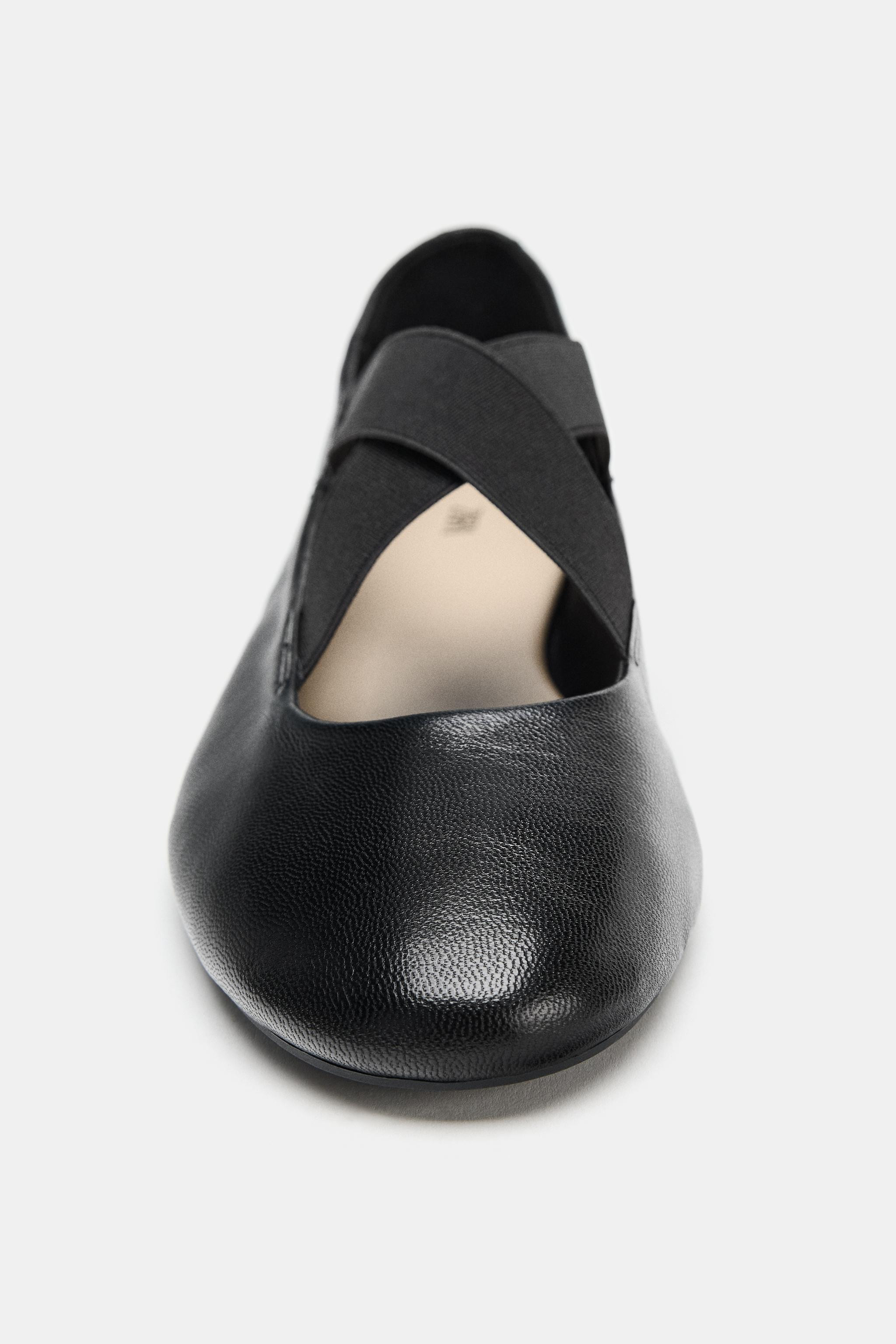 Leather ballet flats. Crossed elastic straps at the front. Round toe.Sole height: 0.8 inches (2 c... | Zara US