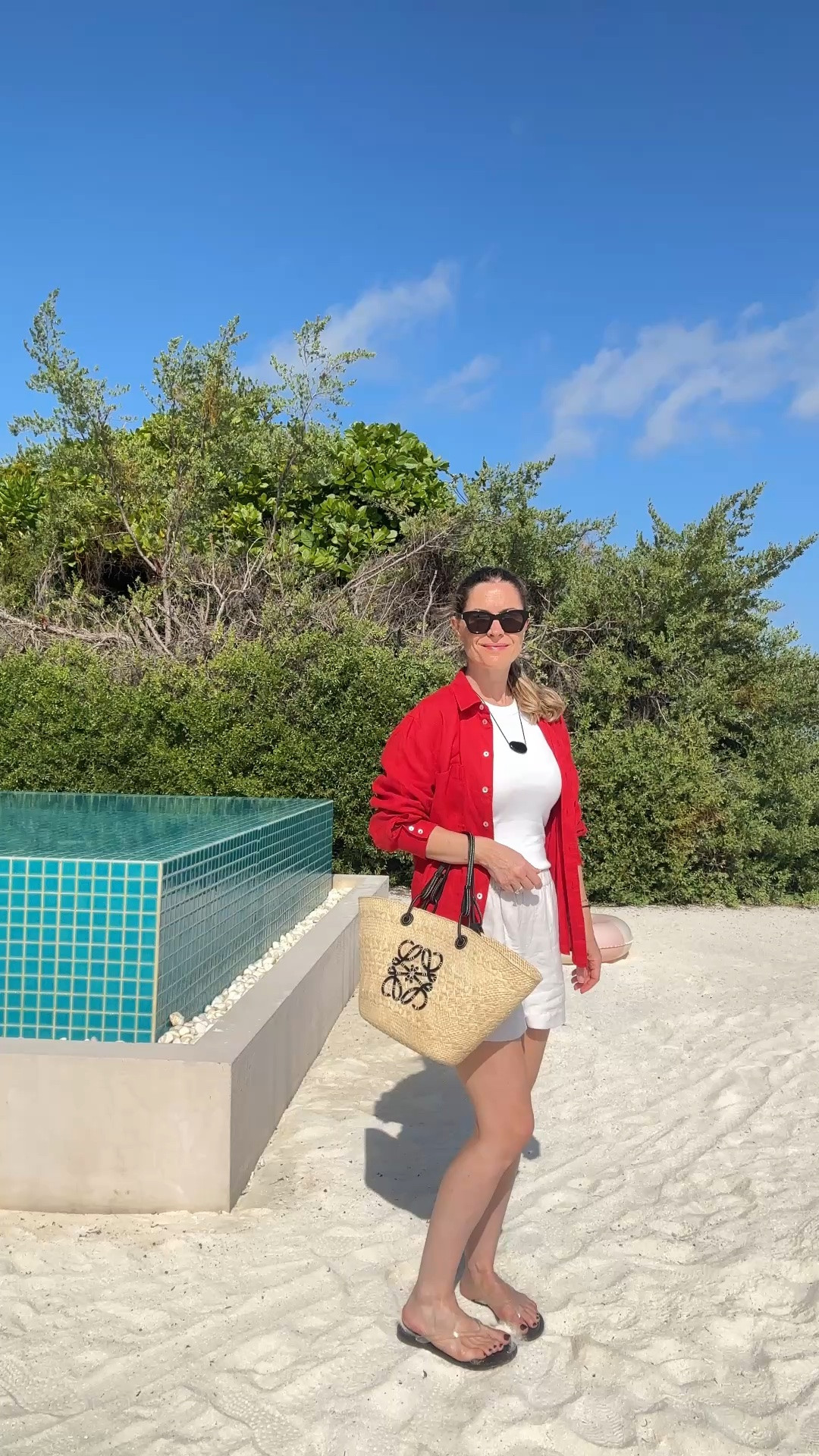 Resort wear beach holiday linen shorts red linen shirt Loewe raffia basket bag black cord necklace jelly sandals

#LTKuk #LTKsummer #LTKeurope