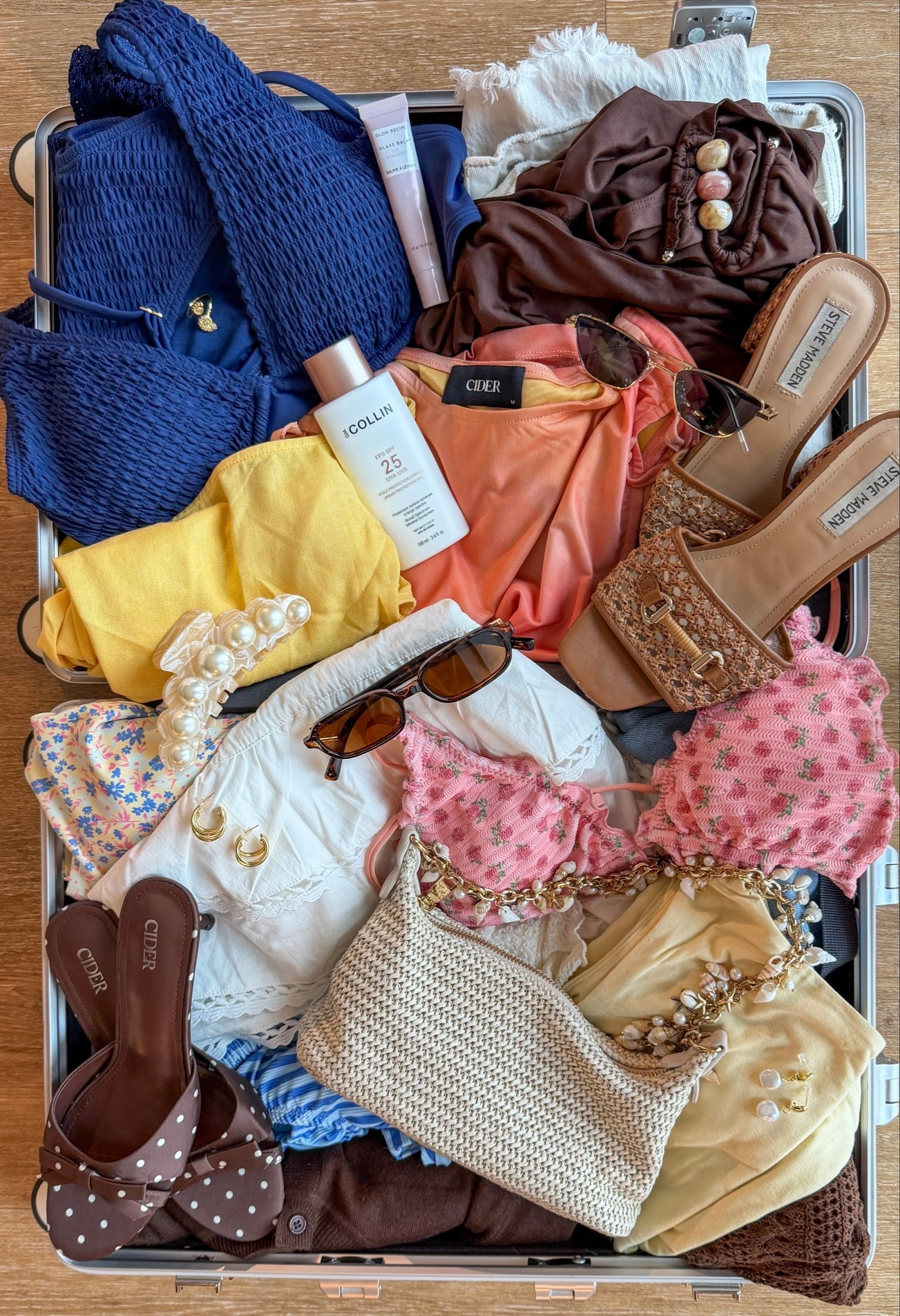 Escaping to warm weather with a suitcase full of tons of color, kinis and mini skirts


#LTKSpringSale #LTKTravel #LTKSwim