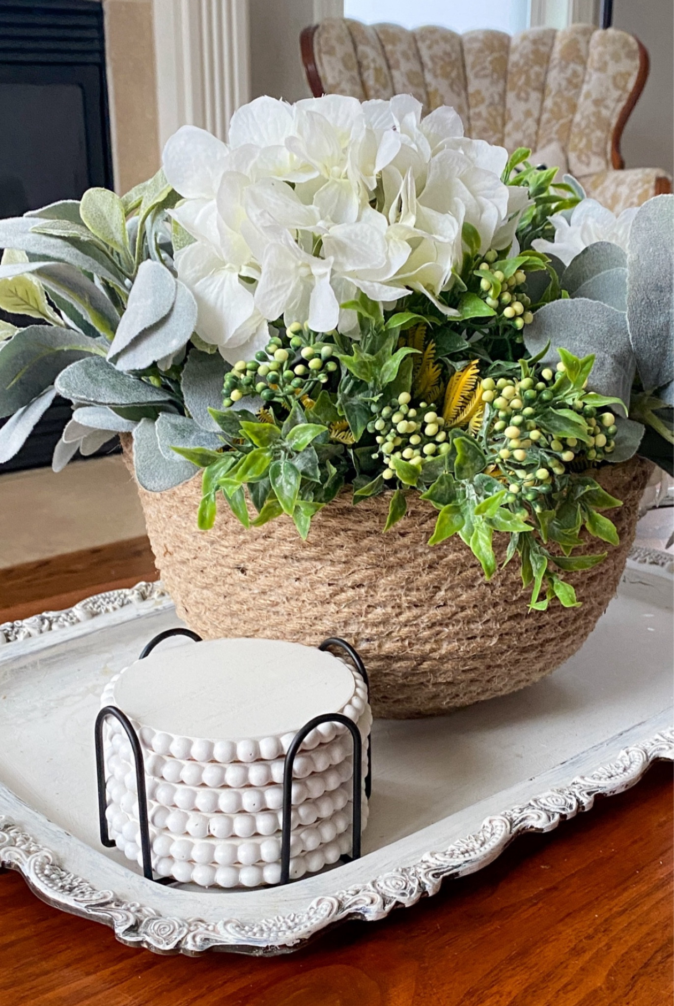 Loving this elegant farmhouse coffee table look in my living room! What do you think of my fake hydrangeas, lambs eat, and new coasters? 

Farmhouse styled coffee table | round coasters | farmhouse coasters | rope bowl | antique tray 

#LTKSaleAlert #LTKHome #LTKFindsUnder50