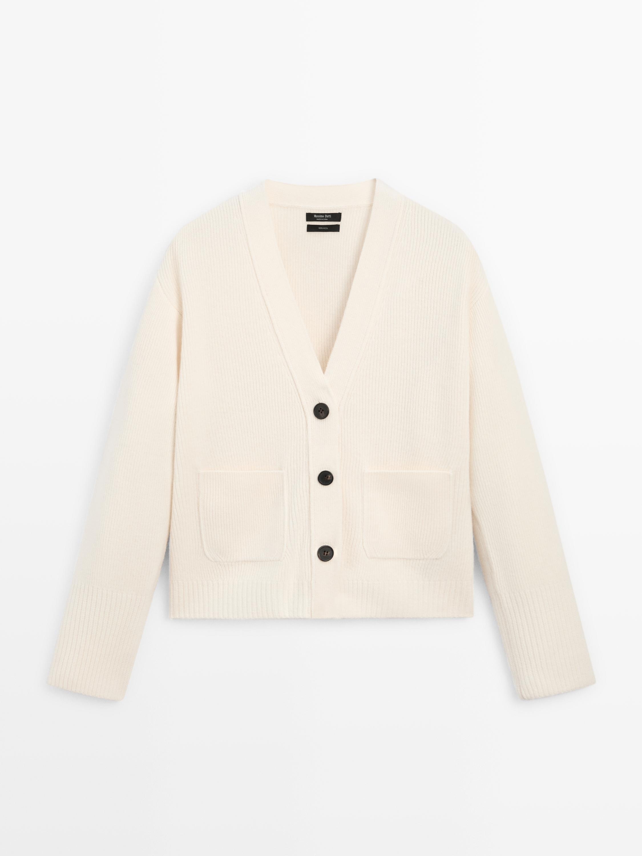 100% wool knit cardigan. V-neck. Three-button fastening. Two front pockets . Ribbed trims . | Massimo Dutti UK