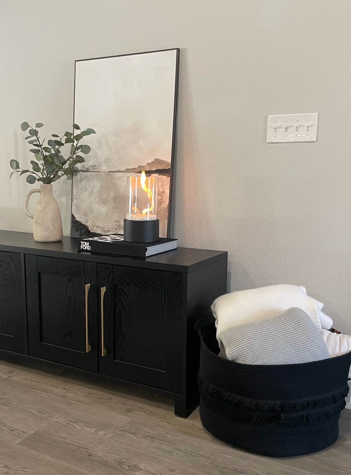 Living room inspiration, living room decor, modern living room, living room styling, modern home decor, black sideboard, black modern tv stand, Tom ford Book, candle sticks, affordable white decorative bowl, eucalyptus stems, neutral living room, organic modern style 

#Modernhome
#NeutralHomeDecor
#Organicmodern
#Cleanhome
#Aesthetic 
#InteriorDesign 
#Modernorganic 
#Budgetfriendly 
#NeutralHome
#MinimalistHome
#Organichome
#ModernAesthetic
#neutraldecor