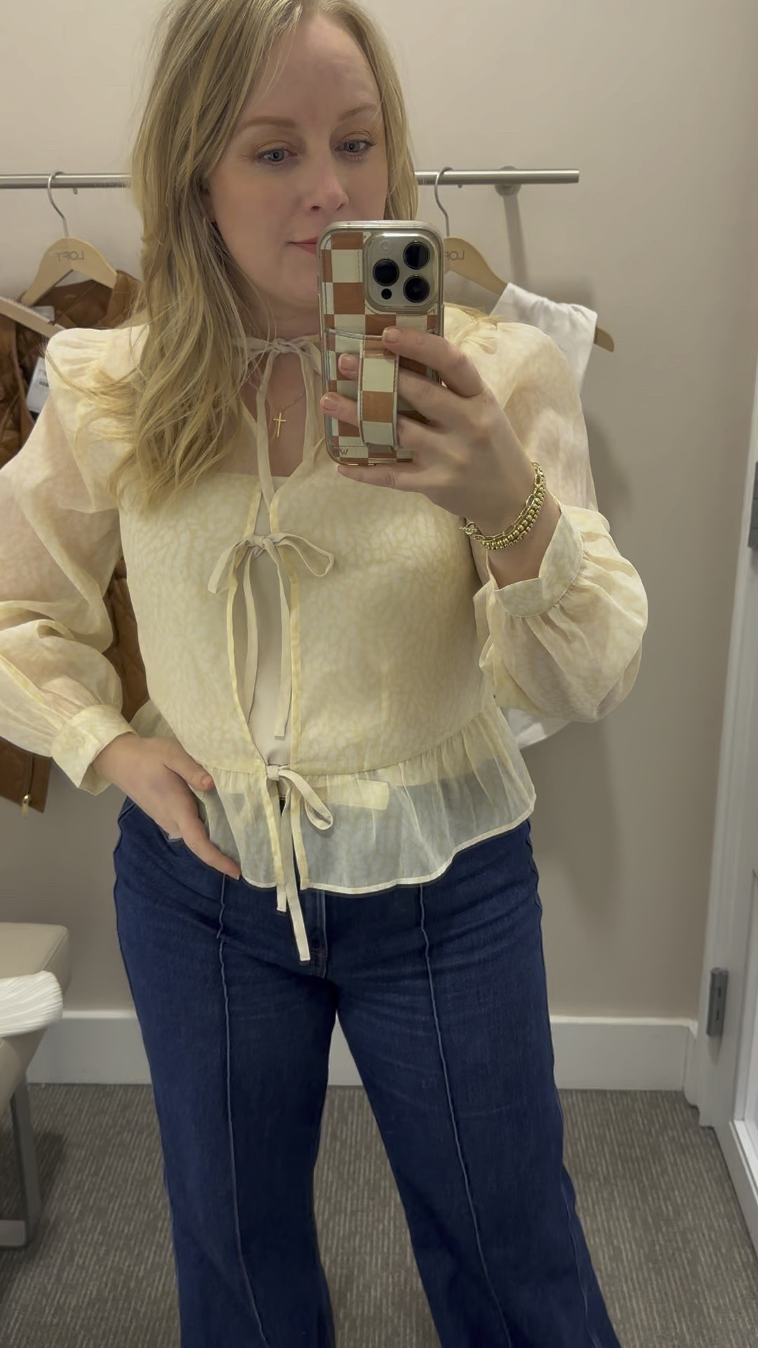 I am wearing this shirt backwards but love it this way! In a medium.  