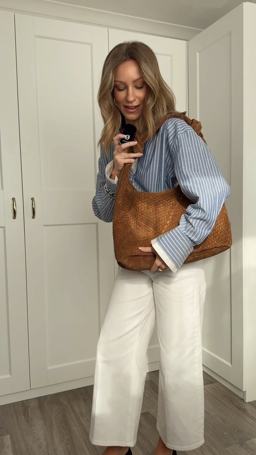 Spring capsule wardrobe, white jeans, white denim, spring wardrobe, spring outfit, stripe shirt, suede bag, suede ballet flats, brown shoes, silver jewellery 

#LTKspring #LTKstyletip #LTKuk