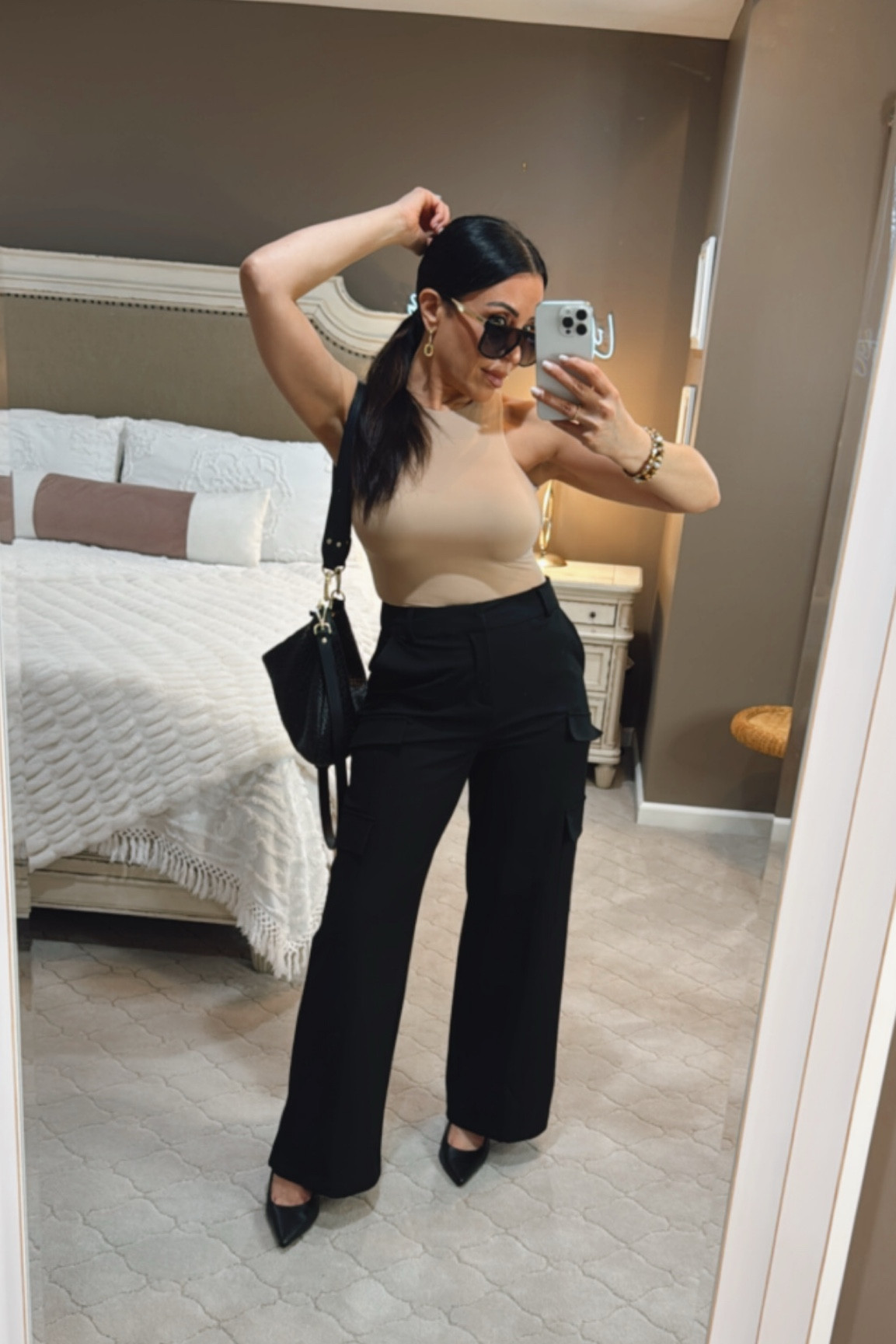 Seriously, I love this bodysuit. It’s so butter soft! It features my shoulders and looks great with these high-rise pants from Walmart. The genuine Italian leather bag and bodysuit are from Quince. They have great prices for very well-made pieces. I love to pair their staples with my affordable fashion! 
#quince #affordablefashion #walmartfashion

#LTKOver40 #LTKStyleTip #LTKFindsUnder100