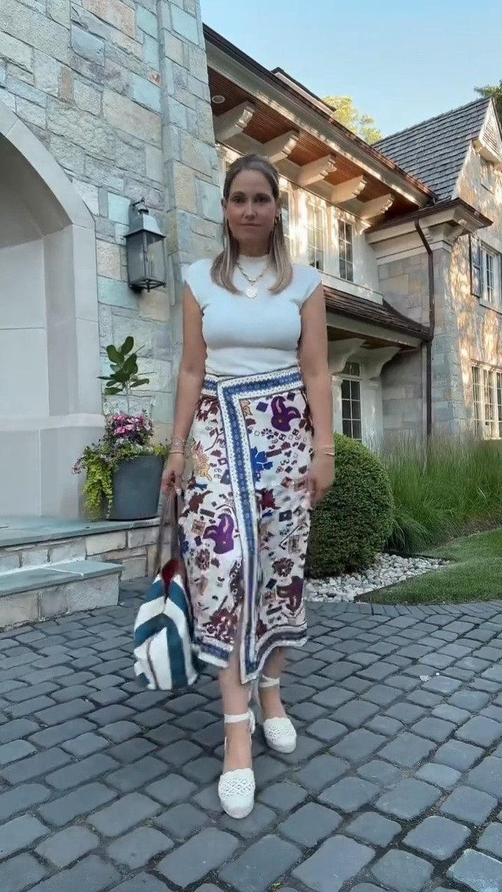 I found the perfect skirt for summer! The wrap style is so flattering, and the colors are so pretty for the season. Style it with a simple top and sandals or wedges for an easy warm-weather look.

#LTKMidsize #LTKOver40 #LTKSeasonal