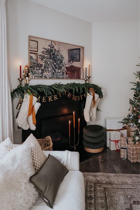 Our home is ready for our holiday party! Christmas living room, ottoman, checkered pillow, brass candelabra 

#LTKSeasonal #LTKhome #LTKHoliday