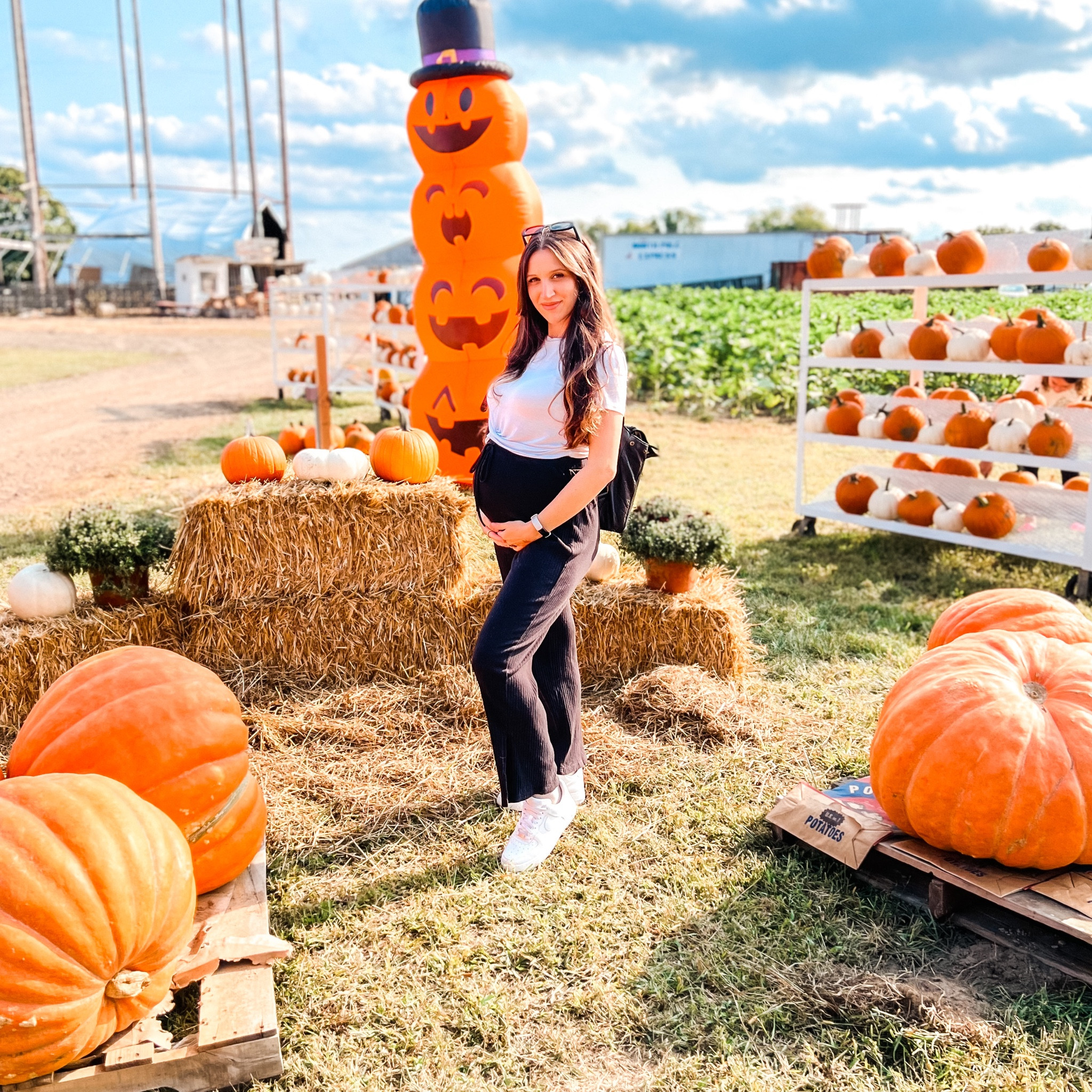 White crop top, black high waist maternity pants, & nike Air Force 1 

#LTKbaby #LTKHalloween #LTKSeasonal