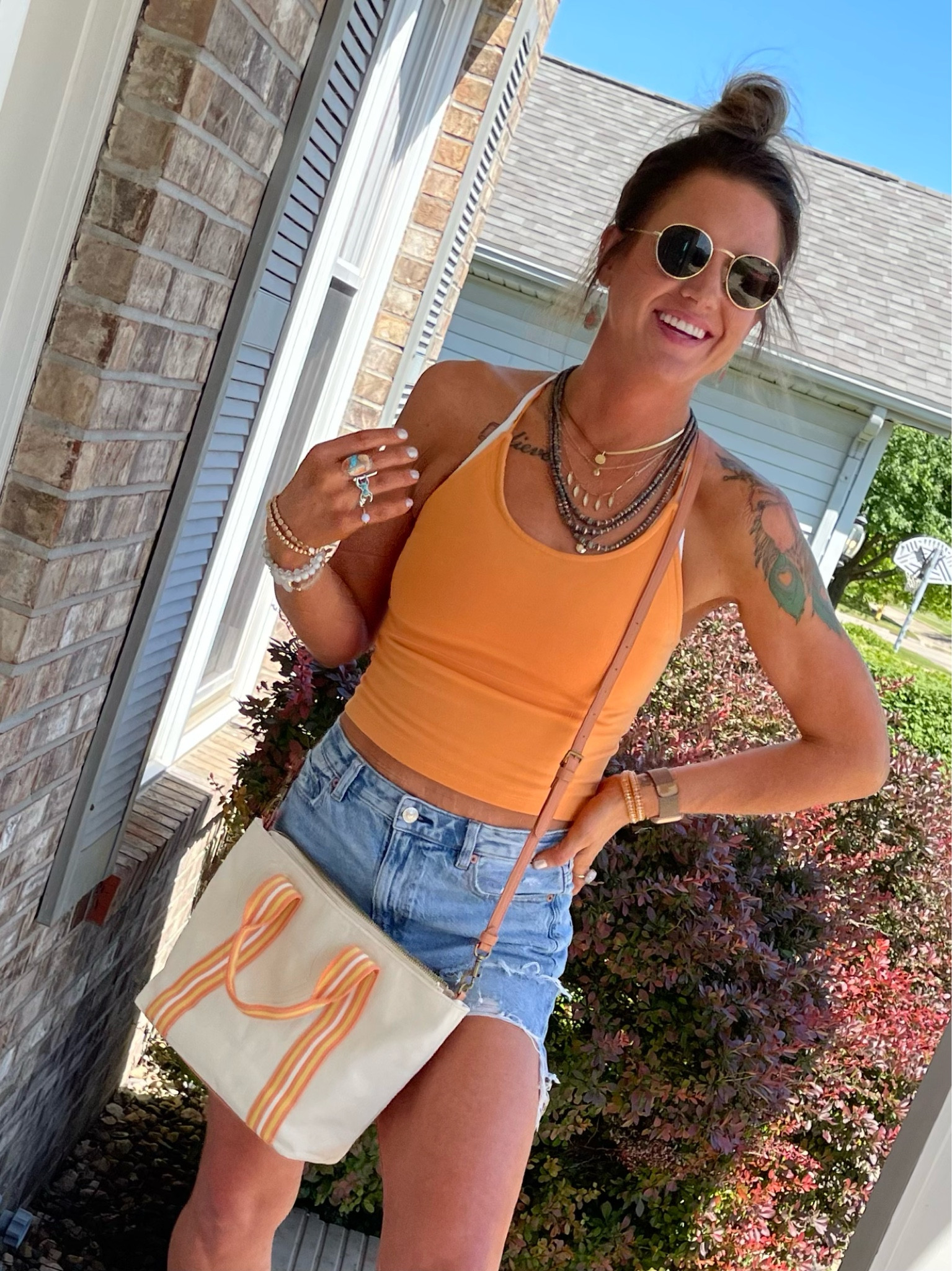 Summer colors make me so happy 🧡🌞🤌🏼 | American Eagle strap oh tank on sale for $11 and available in SO. MANY. COLORS. 

#summer #summercolors #summerfashion #summerstyle #salefinds

#LTKSeasonal #LTKsalealert #LTKunder50