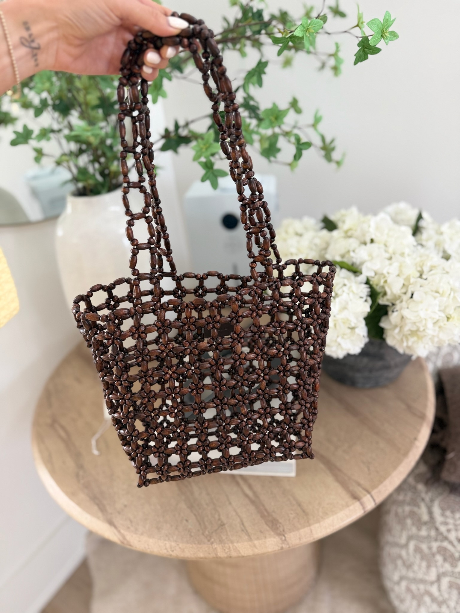 This woven beaded bag adds the cutest detail to any warm weather outfit. It’s the kind of accessory that makes a simple dress, denim shorts, or a beach look feel a little more special.

Woven bag, beaded bag, summer accessories, vacation style, beach bag, statement accessory, resort wear, cute handbags, warm weather style, outfit details, summer fashion, annabrstyle

#LTKOver40 #LTKTravel #LTKSeasonal