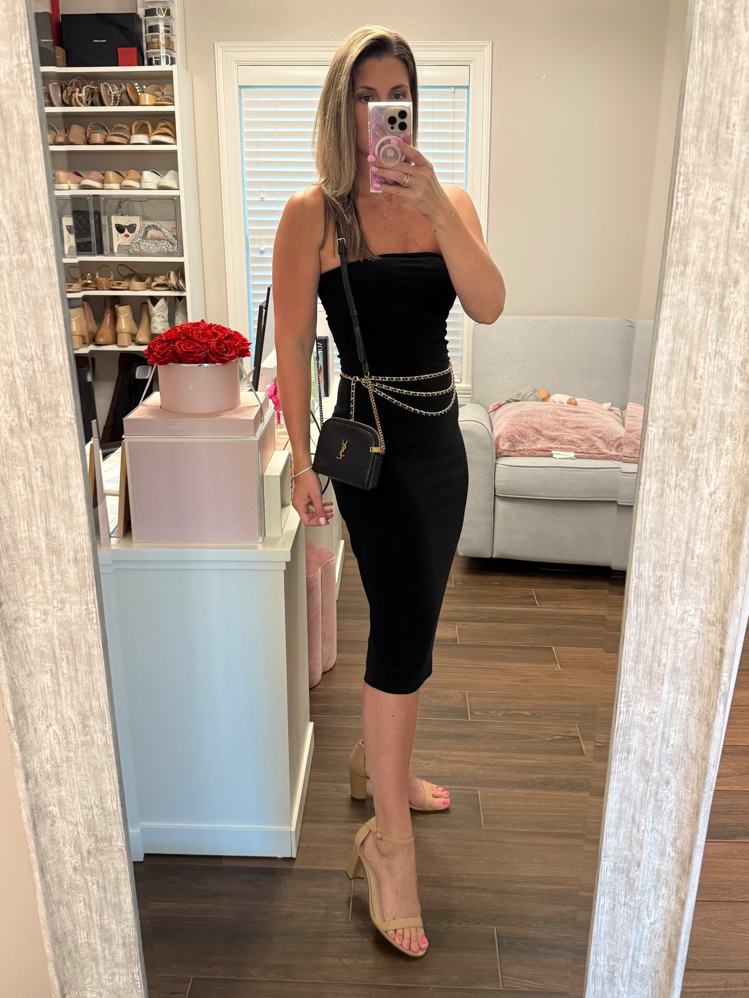 Kept it simple yet chic for girls night out with this strapless midi dress (spoiler alert: it didn’t move once!) A dress like this needs accessories and I loved pairing it with this woven leather chain belt for a nod to the 90s. Finished with a small black crossbody with gold hardware and my favorite nude block heeled sandals. 

The dress runs TTS. Wearing size S.
The sandals run TTS. 


#LTKOver40 #LTKStyleTip #LTKShoeCrush