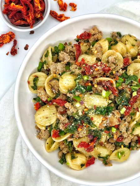 🌶️SPICY TUSCAN ORECCHIETTE PASTA🌶️  This dish is ready in 25 minutes and has lots of flavor! 

INGREDIENTS 
16 oz box of @dececco_pasta orecchiette pasta
Olive oil
6-8 garlic cloves, chopped 
1 medium onion, diced 
5 Italian sausages (meat removed from casing)
Salt, cracked pepper, garlic salt, red pepper - to taste 
3 cups kale, chopped 
1 cup sun-dried tomatoes, sliced 
@belgioiosocheese parmesan cheese (measure with your ❤️) 
1 jalapeño, diced (optional) 

DIRECTIONS 
1. Cook pasta according to package instructions. Toss with olive oil when done. 
2. Drizzle olive oil in a large pan on medium heat. 
3. Add garlic, onions, sausage and seasoning. Cook until meat is browned, making sure to chop well. 
4. Mix in kale, sun-dried tomatoes and Parmesan cheese. Cook for about 2 more minutes. 
5. Combine sausage mixture and pasta. Drizzle with more olive oil, salt and pepper, gently mix. 
6. Top with Parmesan cheese and jalapeños. 

#easyrecipes #pasta #pastarecipes #pastadishes #spicy #quickmeals #food #cooking #potsandpans #whitebowl #kitchen

#LTKfindsunder50 #LTKsalealert #LTKfindsunder100