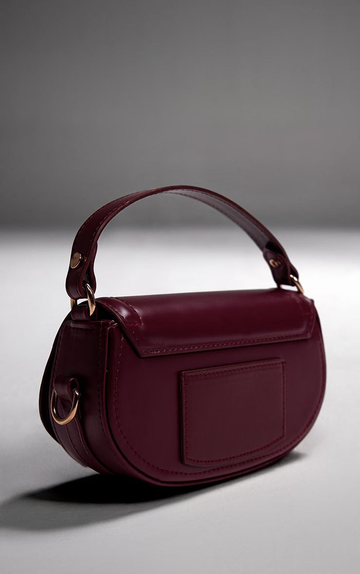 Burgundy Mini Round Cross Body Bag | PrettyLittleThing US
