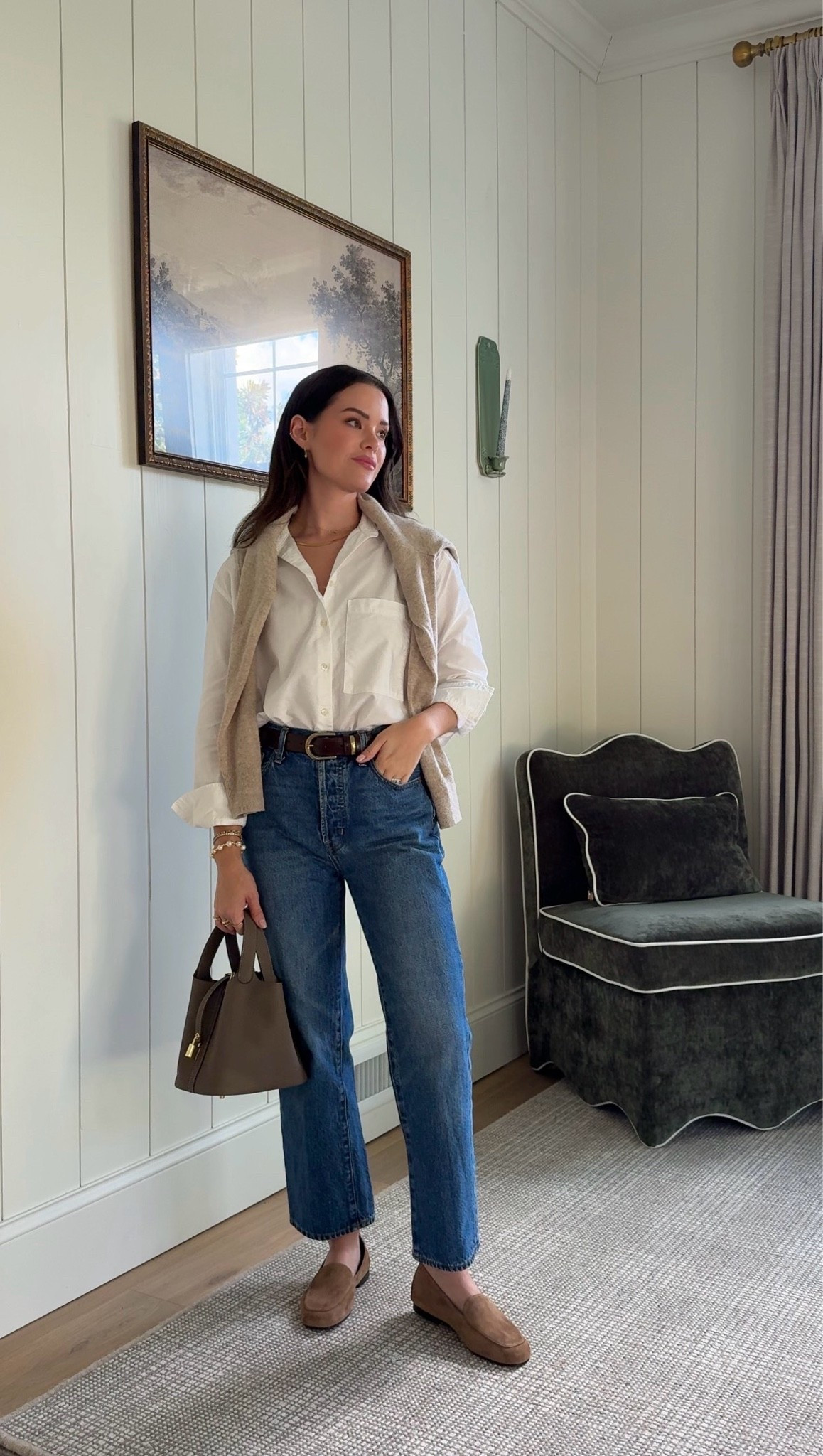 A white shirt, denim, suede loafers, and a cardigan on standby. My kind of early-fall outfit.

Comment SHOP for outfit details sent straight to your DMs 🤍