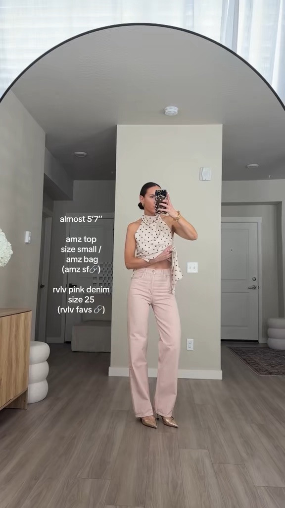 Wearing size 25 in pale pink agolde jeans.  Size small in polka dot top