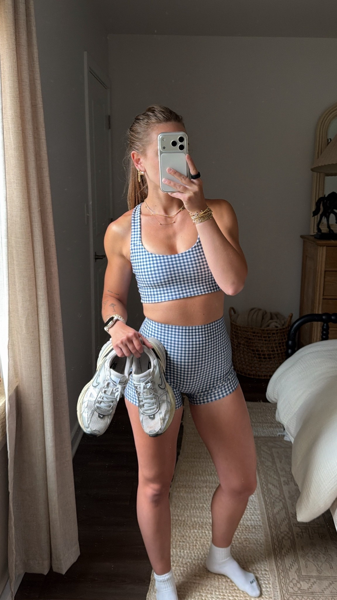 7/21/26 Workout Outfit of the Day

Today’s workout look 💙 Loving this blue gingham Alo set for summer workouts. I’m wearing an XS in both the sports bra and biker shorts, paired with my Nike sneakers, favorite Aritzia socks, and Garmin watch. Everything is linked here ✨

#LTKootd #LTKfitnessgoals #LTKActive